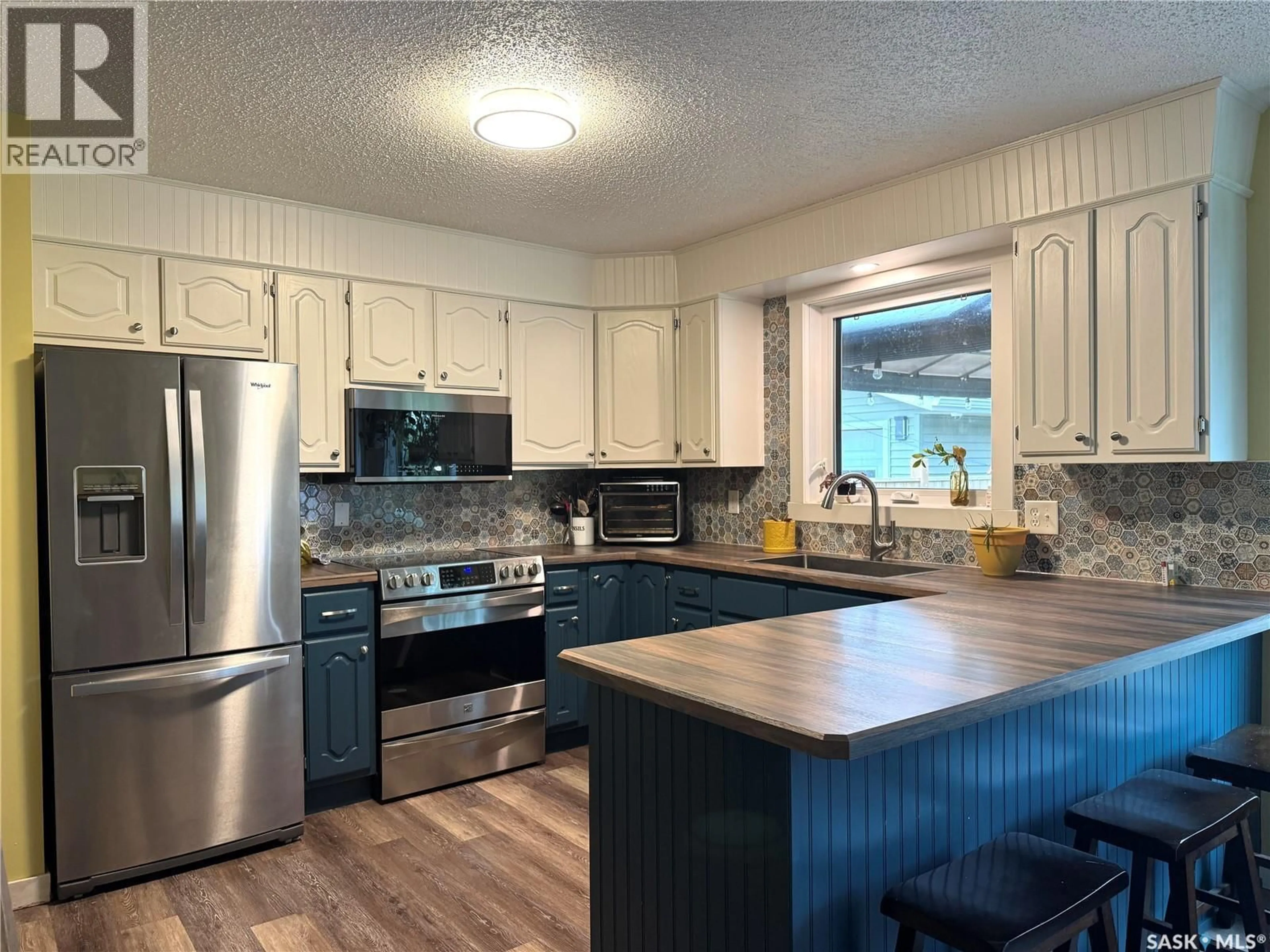 Open concept kitchen, unknown for E - 623 LITTLE QUILL AVENUE, Wynyard Saskatchewan S0A4T0