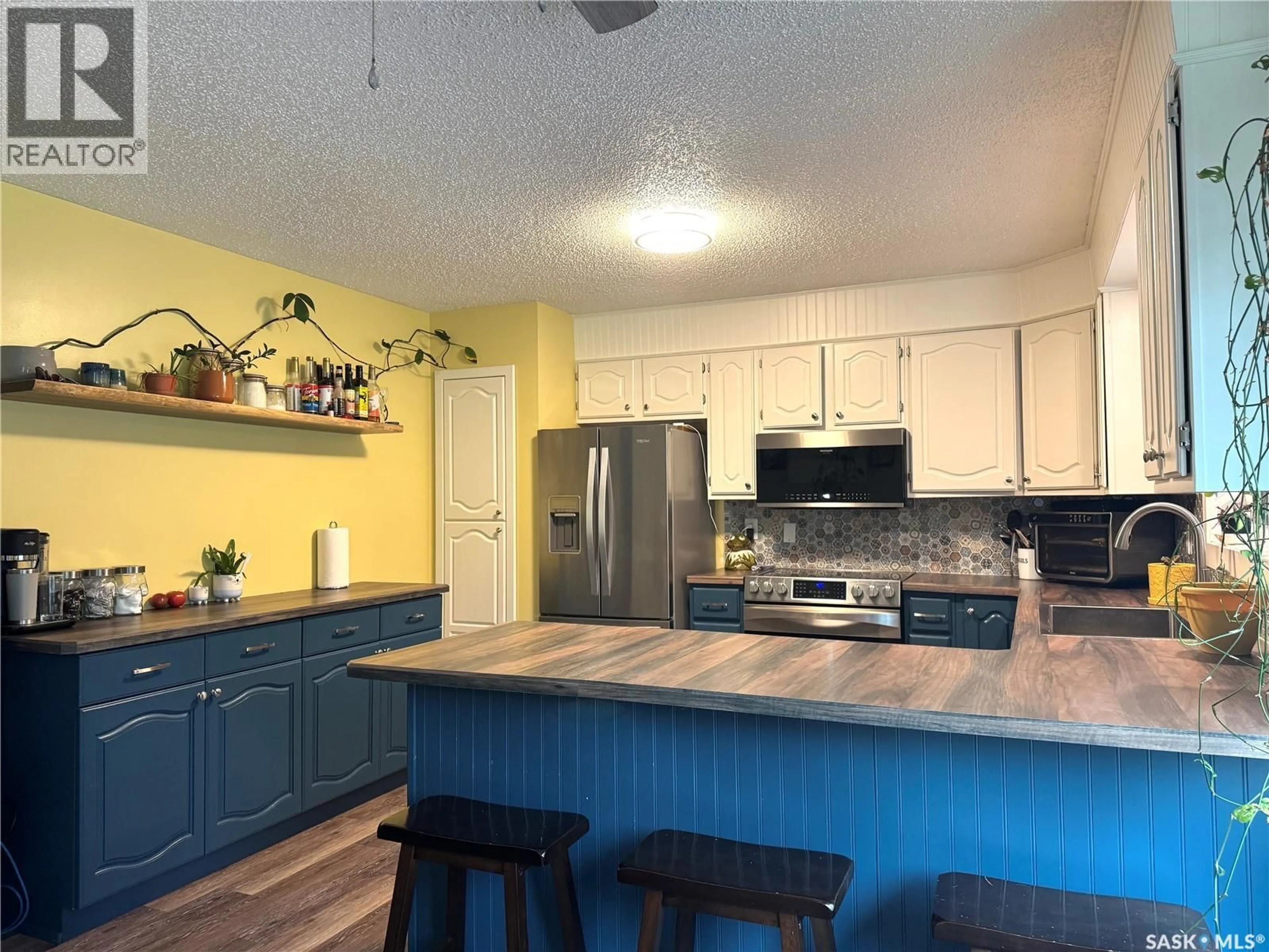 Open concept kitchen, unknown for E - 623 LITTLE QUILL AVENUE, Wynyard Saskatchewan S0A4T0