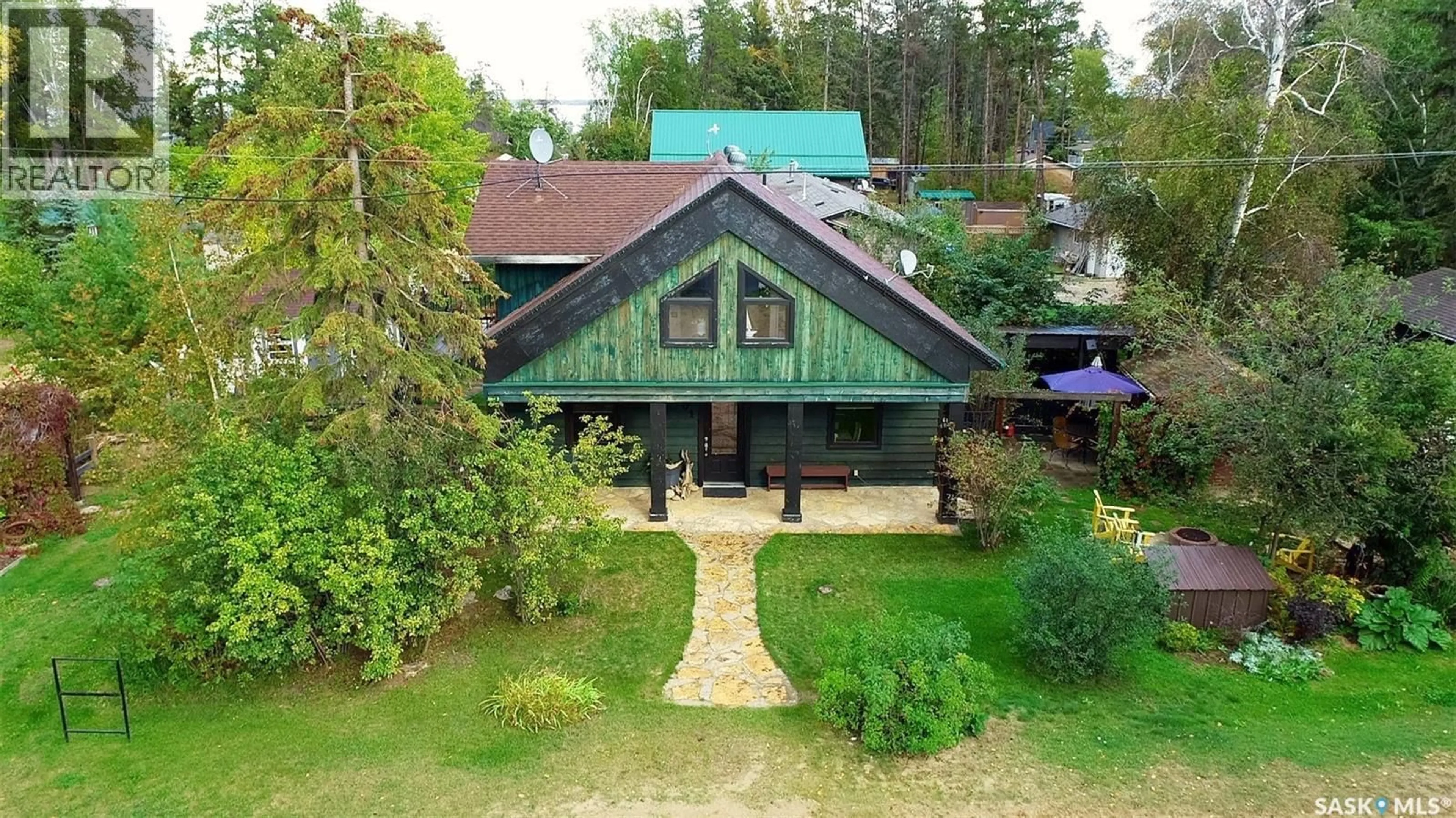 A pic from outside/outdoor area/front of a property/back of a property/a pic from drone, building for 701 PINE DRIVE, Tobin Lake Saskatchewan S0E1E0