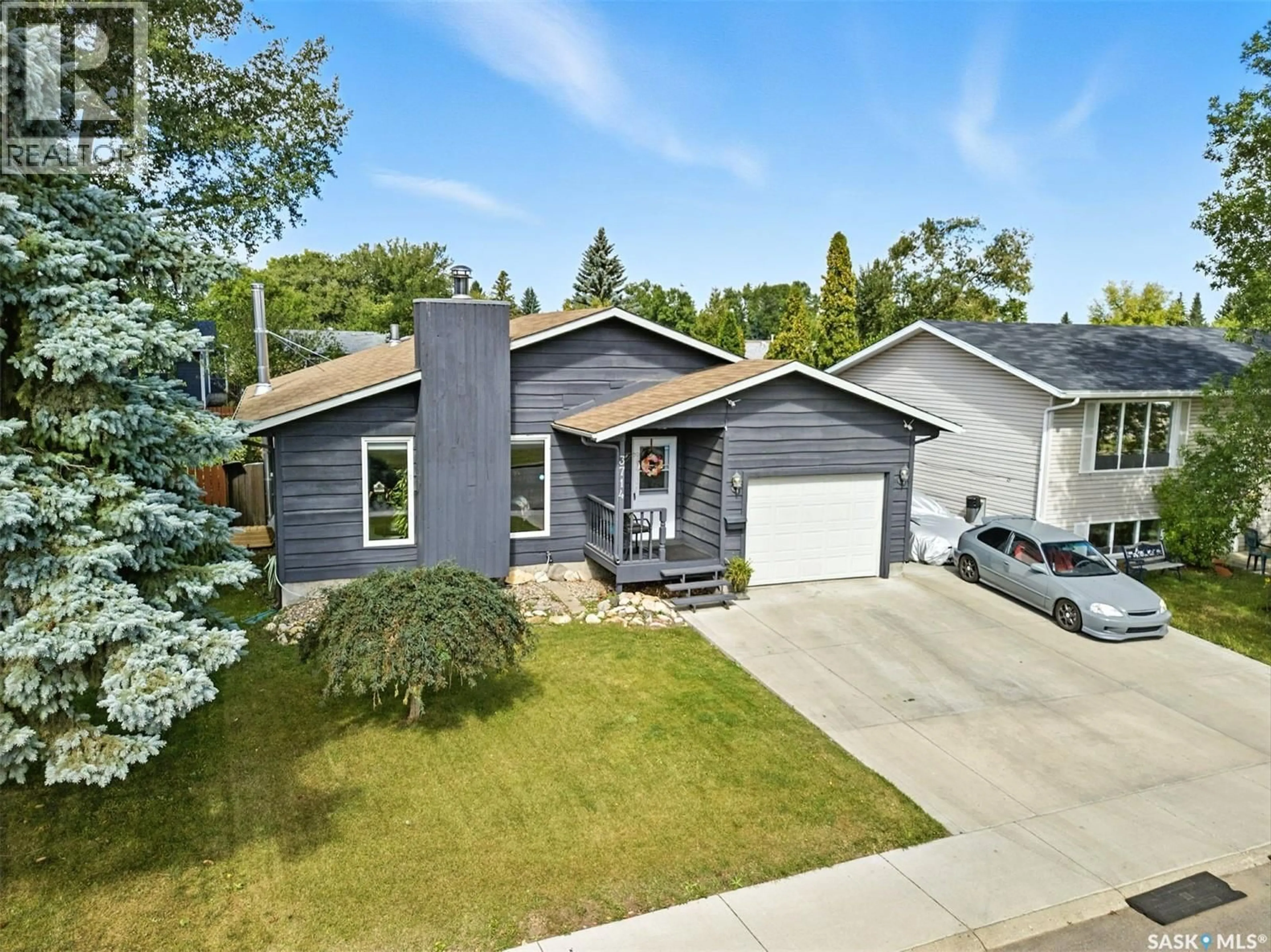 Home with vinyl exterior material, street for 3714 FAIRLIGHT DRIVE, Saskatoon Saskatchewan S7M4T5