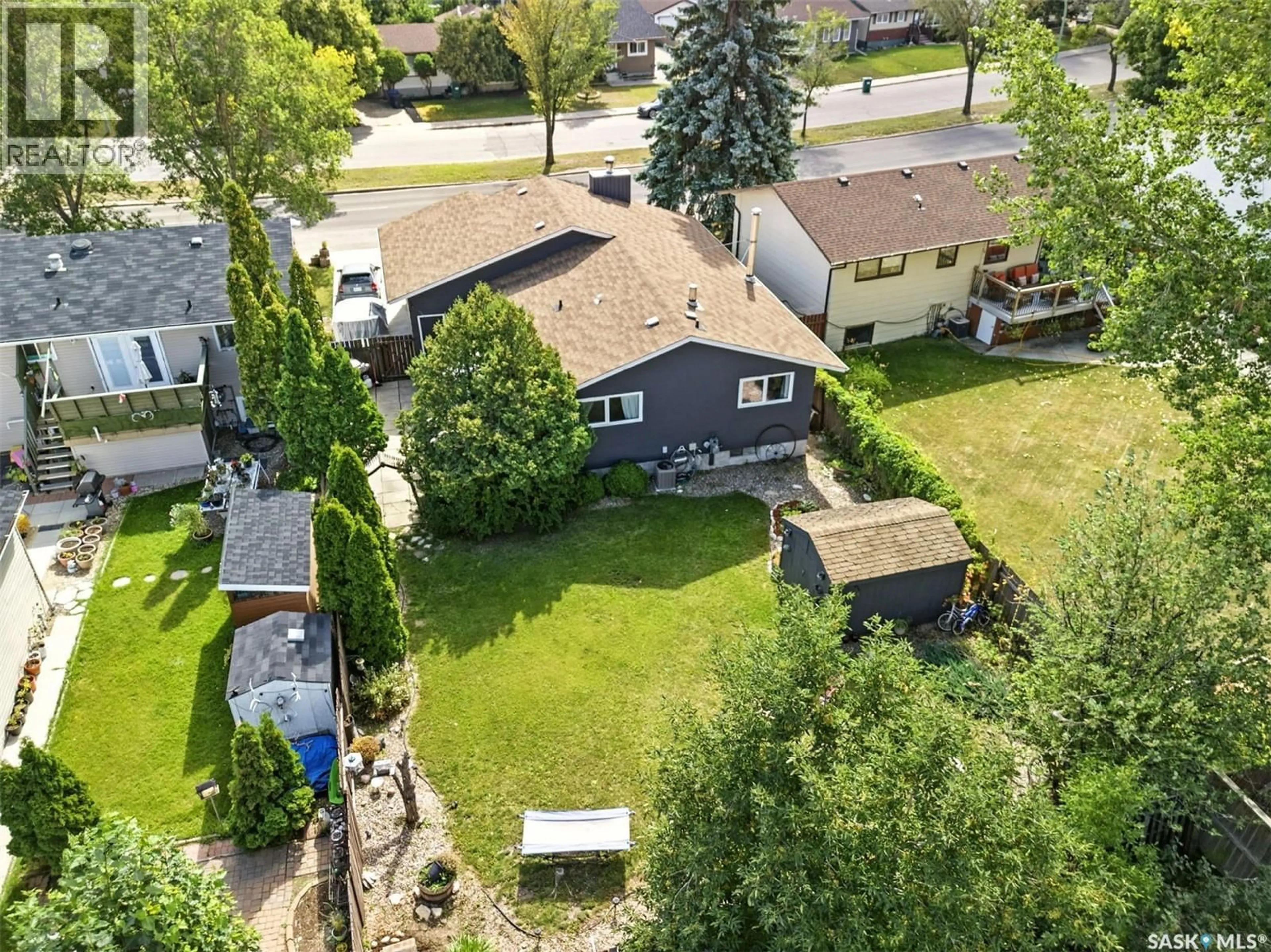 A pic from outside/outdoor area/front of a property/back of a property/a pic from drone, street for 3714 FAIRLIGHT DRIVE, Saskatoon Saskatchewan S7M4T5