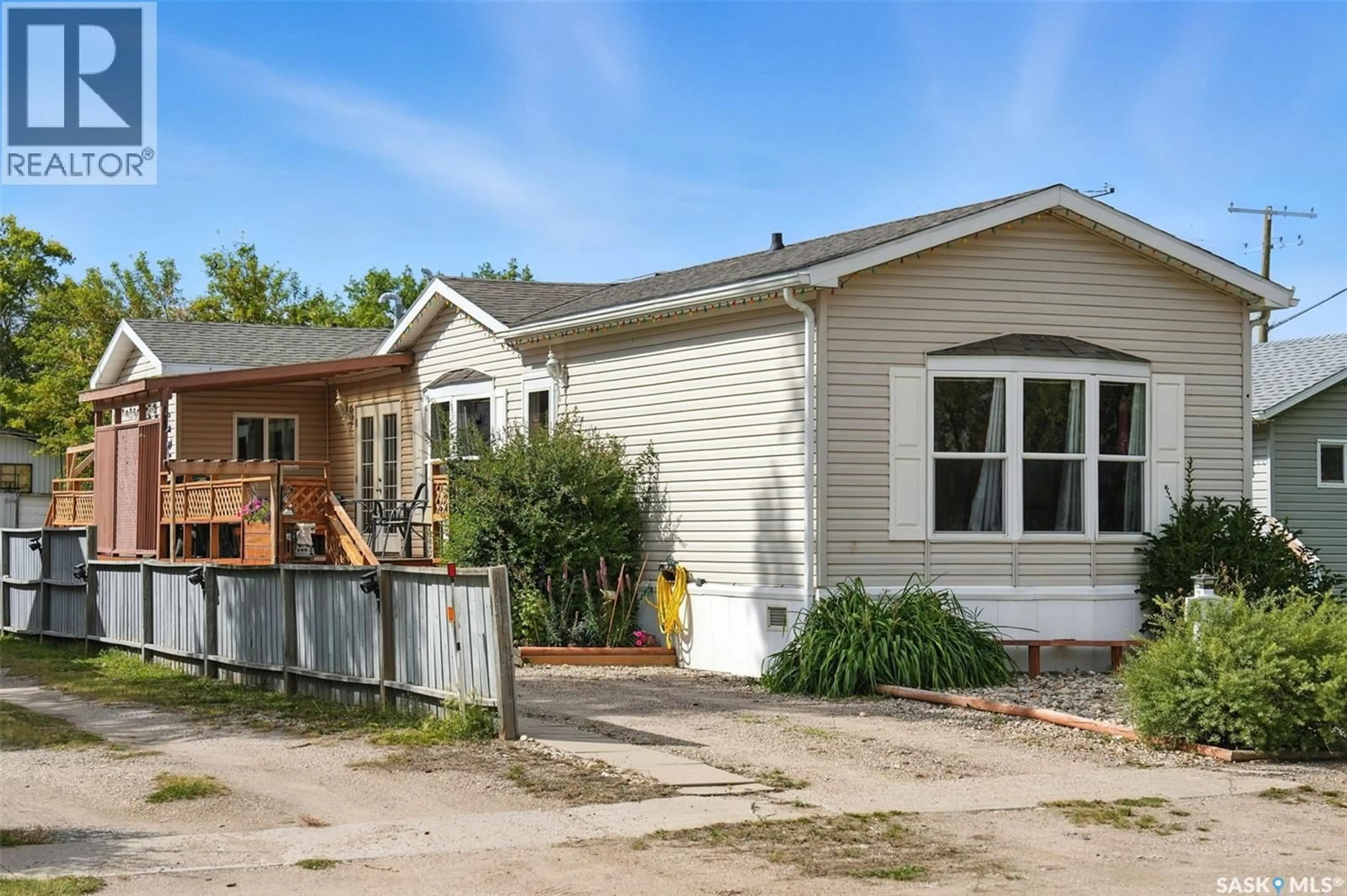 Home with vinyl exterior material, street for 315 MAIN STREET, Vonda Saskatchewan S0K4N0