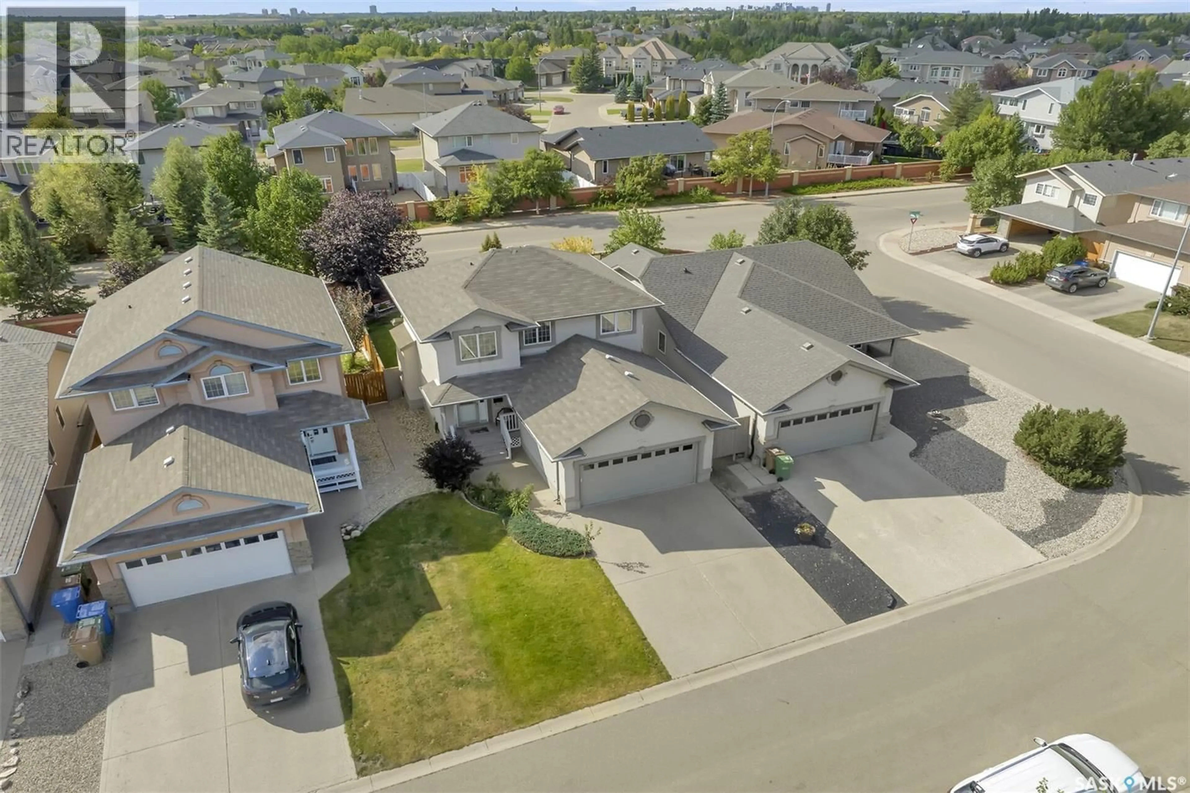 A pic from outside/outdoor area/front of a property/back of a property/a pic from drone, street for 7206 WASCANA COVE WAY, Regina Saskatchewan S4V3G2