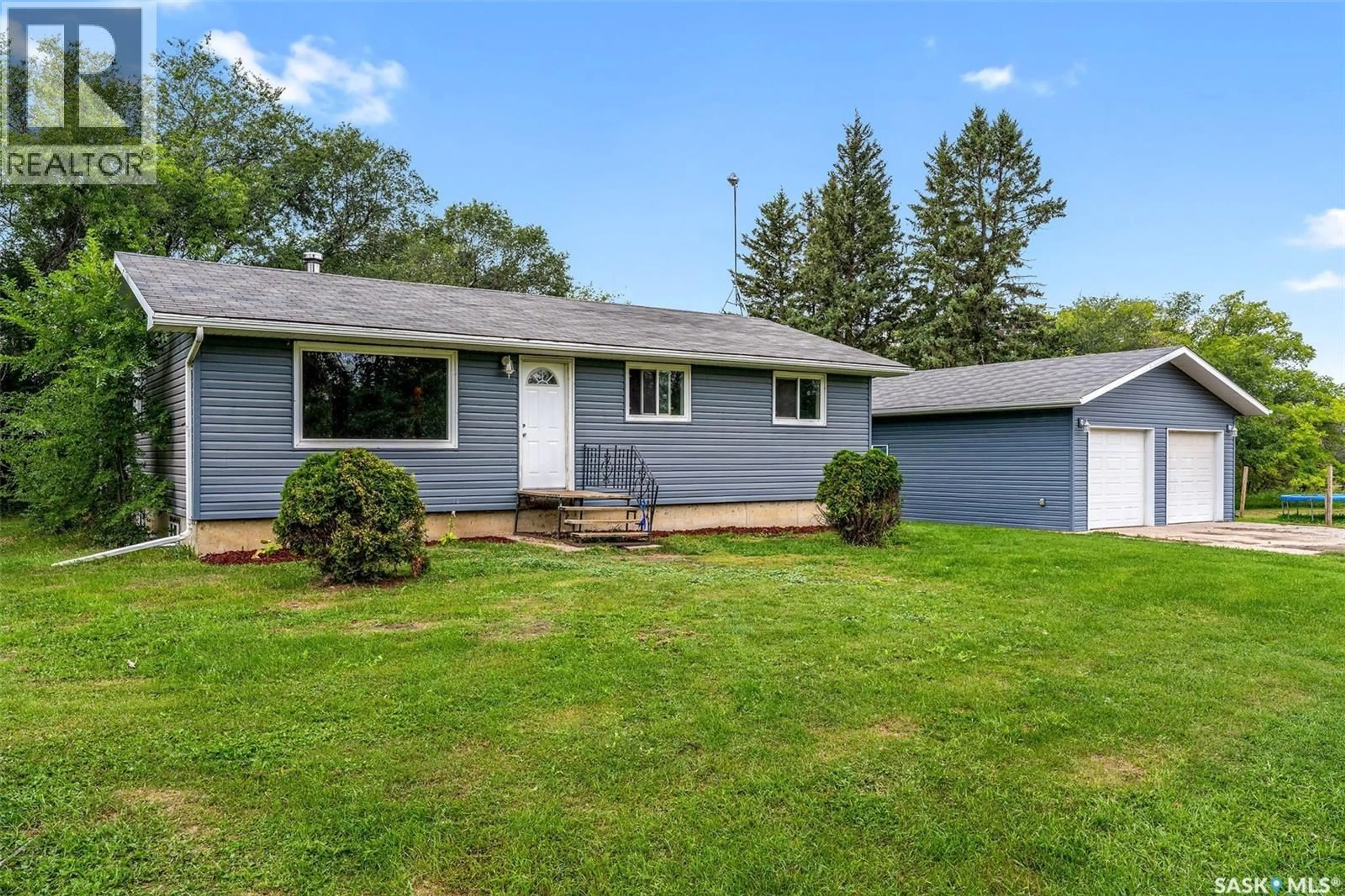 Home with vinyl exterior material, street for KINISTINO ACREAGE, Kinistino Rm No. 459 Saskatchewan S0J1H0