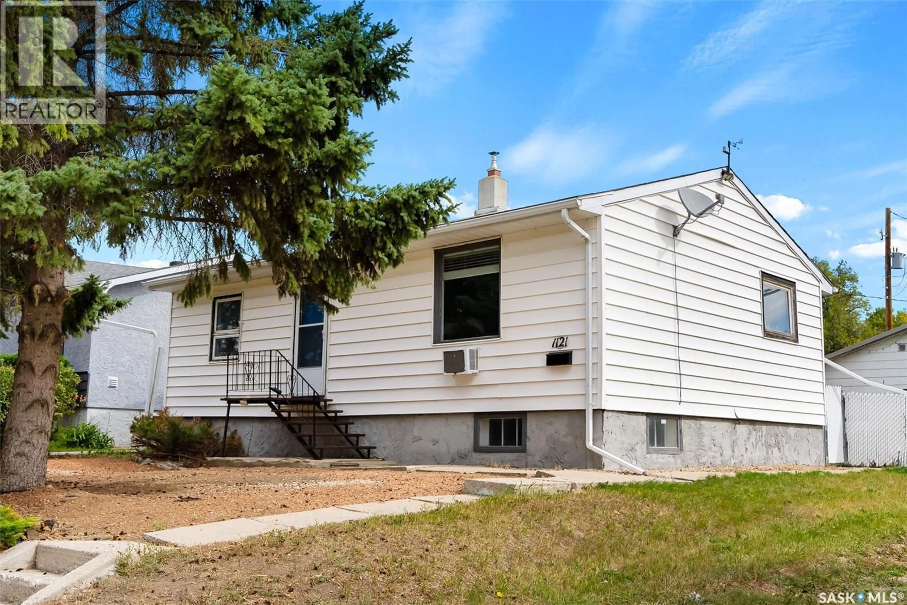 Home with vinyl exterior material, street for 1121 HORACE STREET, Regina Saskatchewan S4T5L5