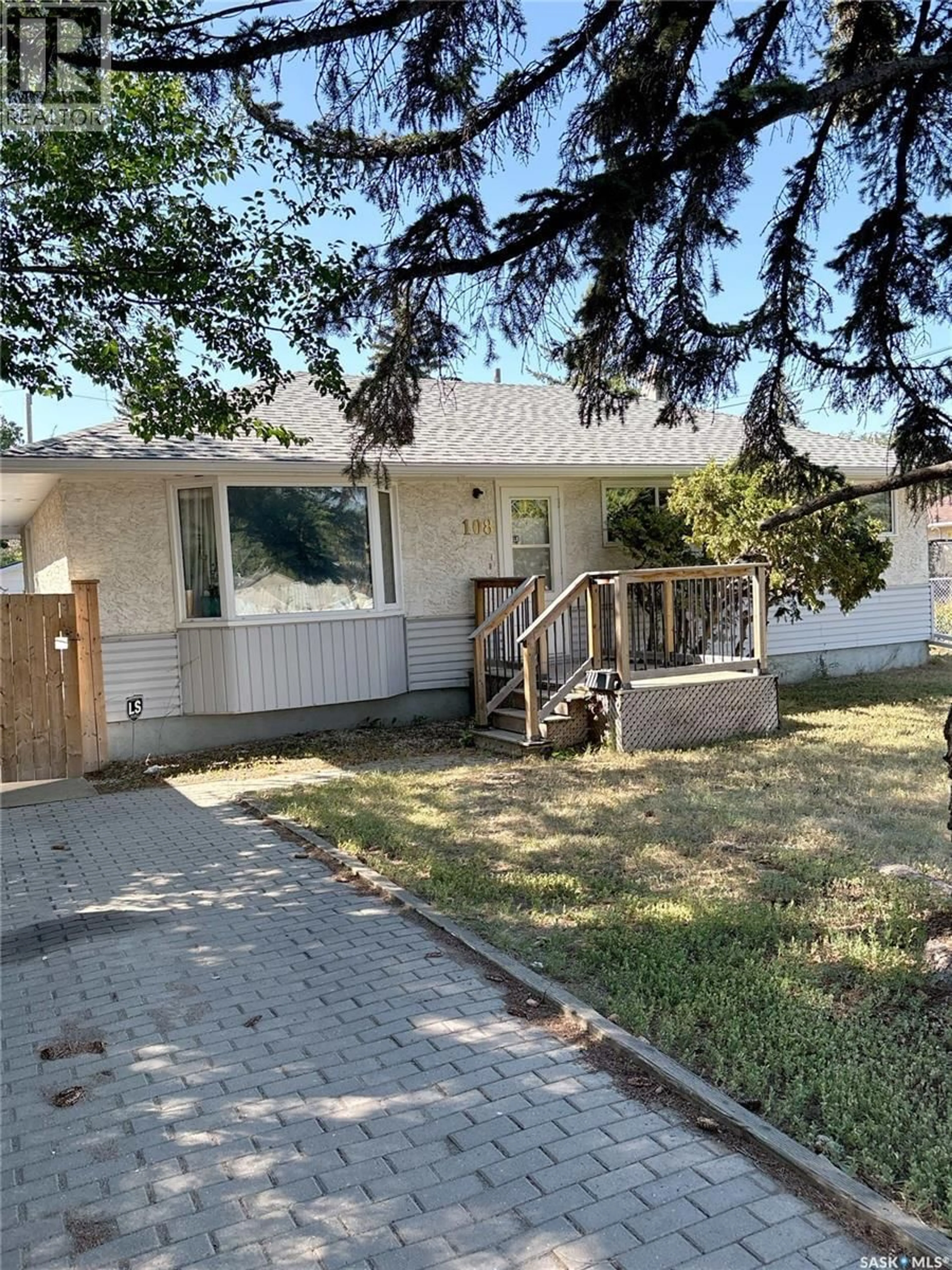 Home with vinyl exterior material, street for 108 MCCANNEL STREET, Regina Saskatchewan S4R3T8