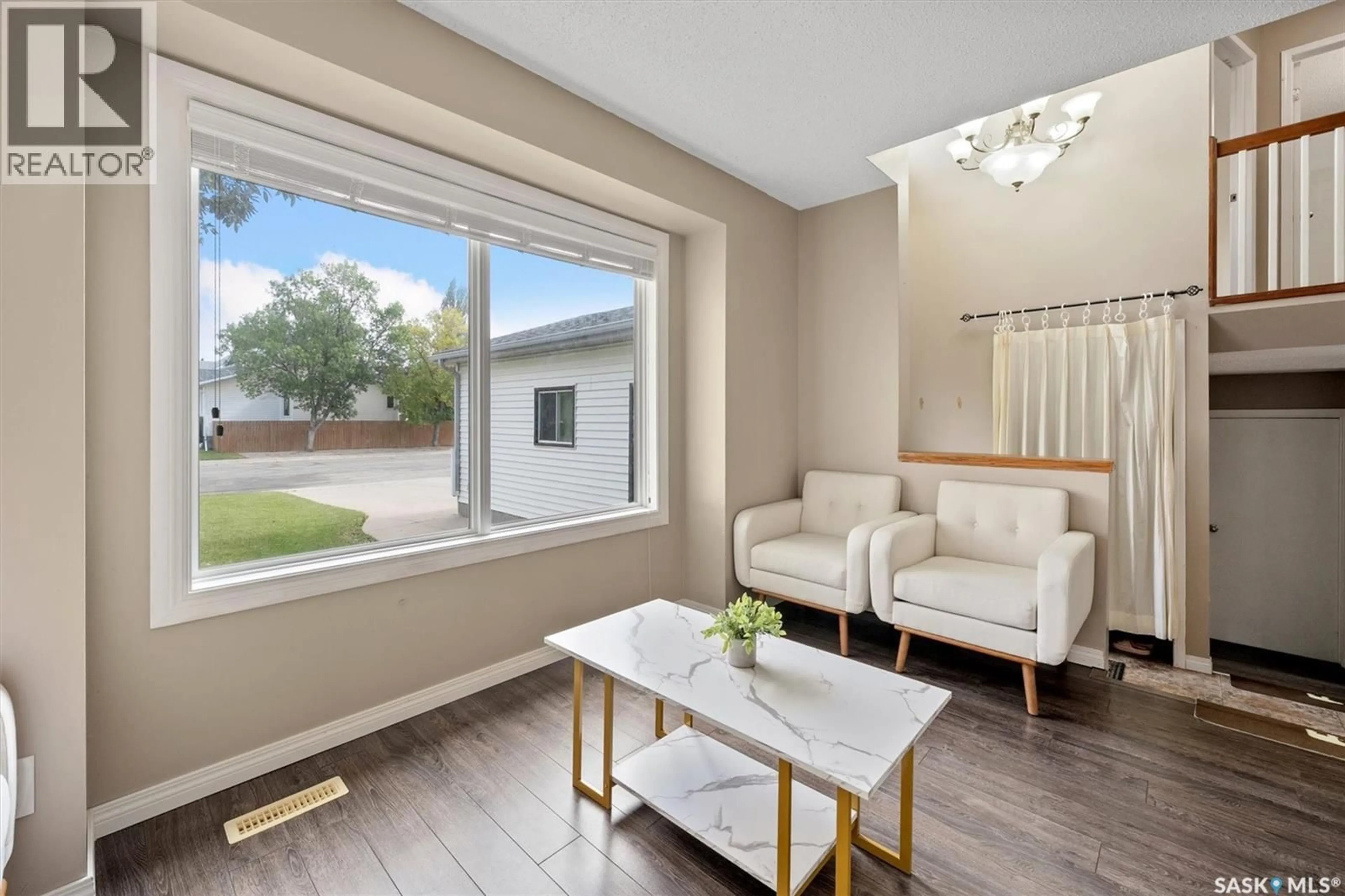 Living room with furniture, unknown for 2035 KENDERDINE ROAD, Saskatoon Saskatchewan S7N4A9