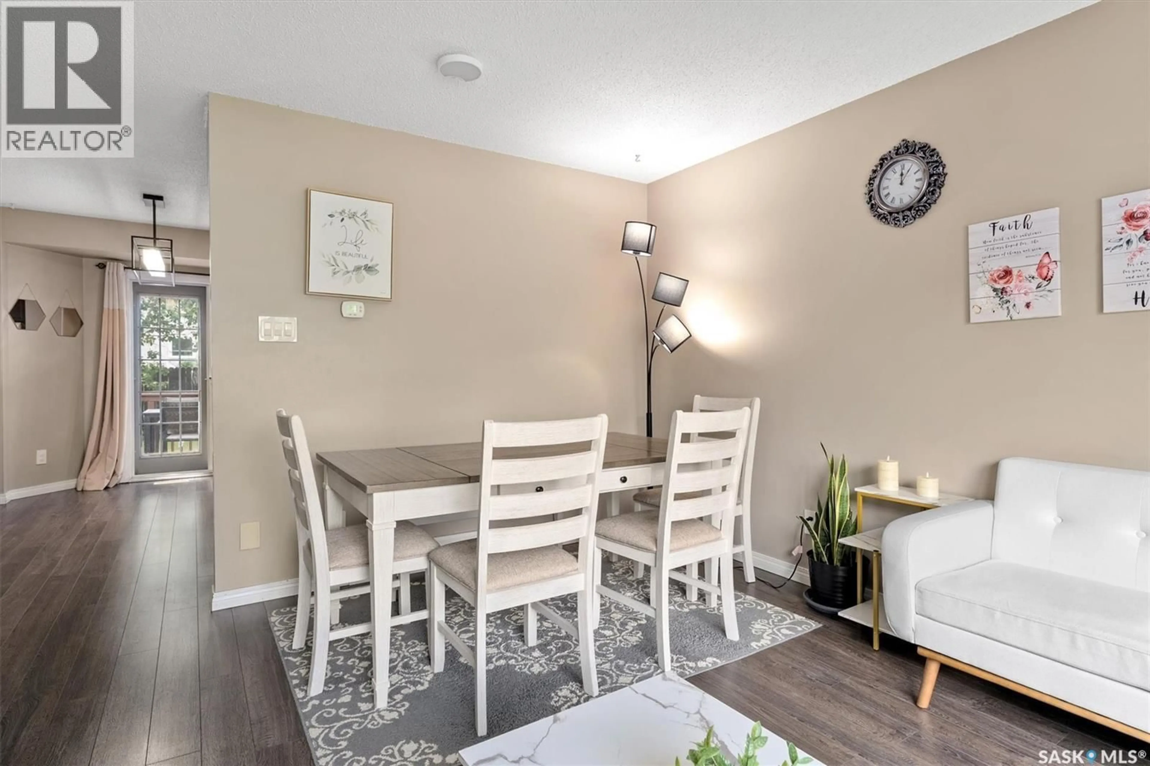 Dining room, wood/laminate floor for 2035 KENDERDINE ROAD, Saskatoon Saskatchewan S7N4A9