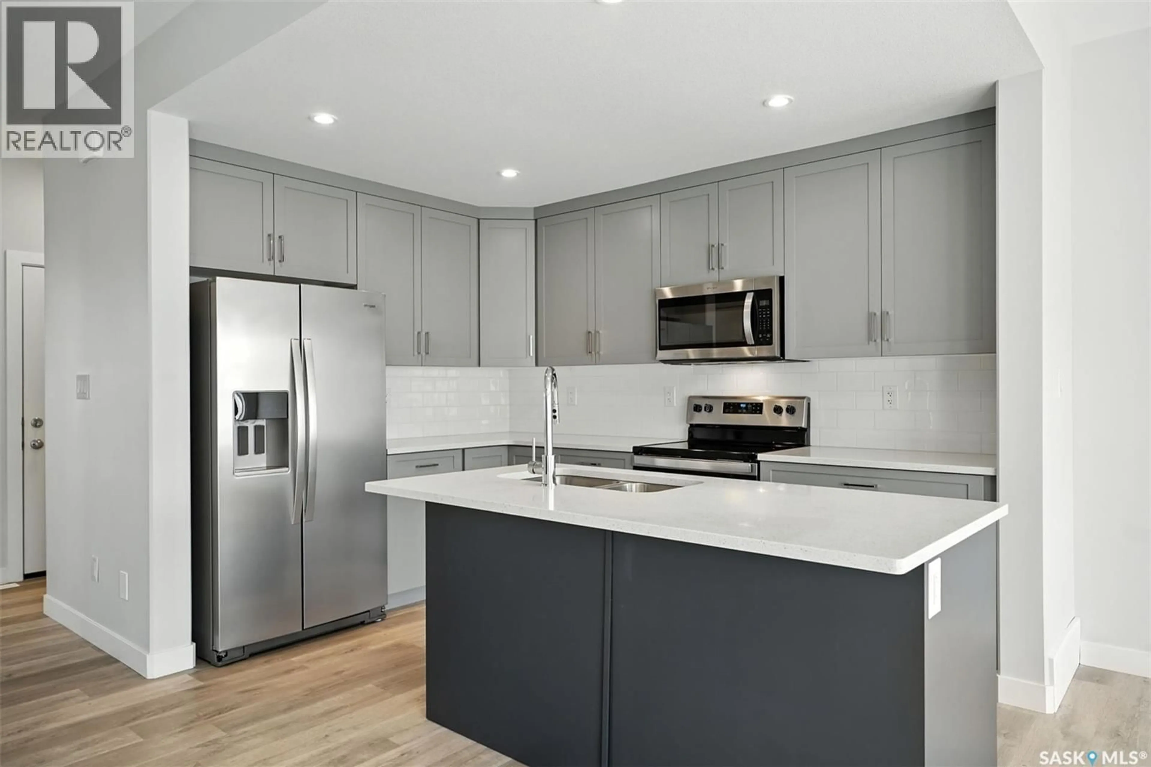 Open concept kitchen, unknown for 506 MYLES HEIDT MANOR, Saskatoon Saskatchewan S7W1H9