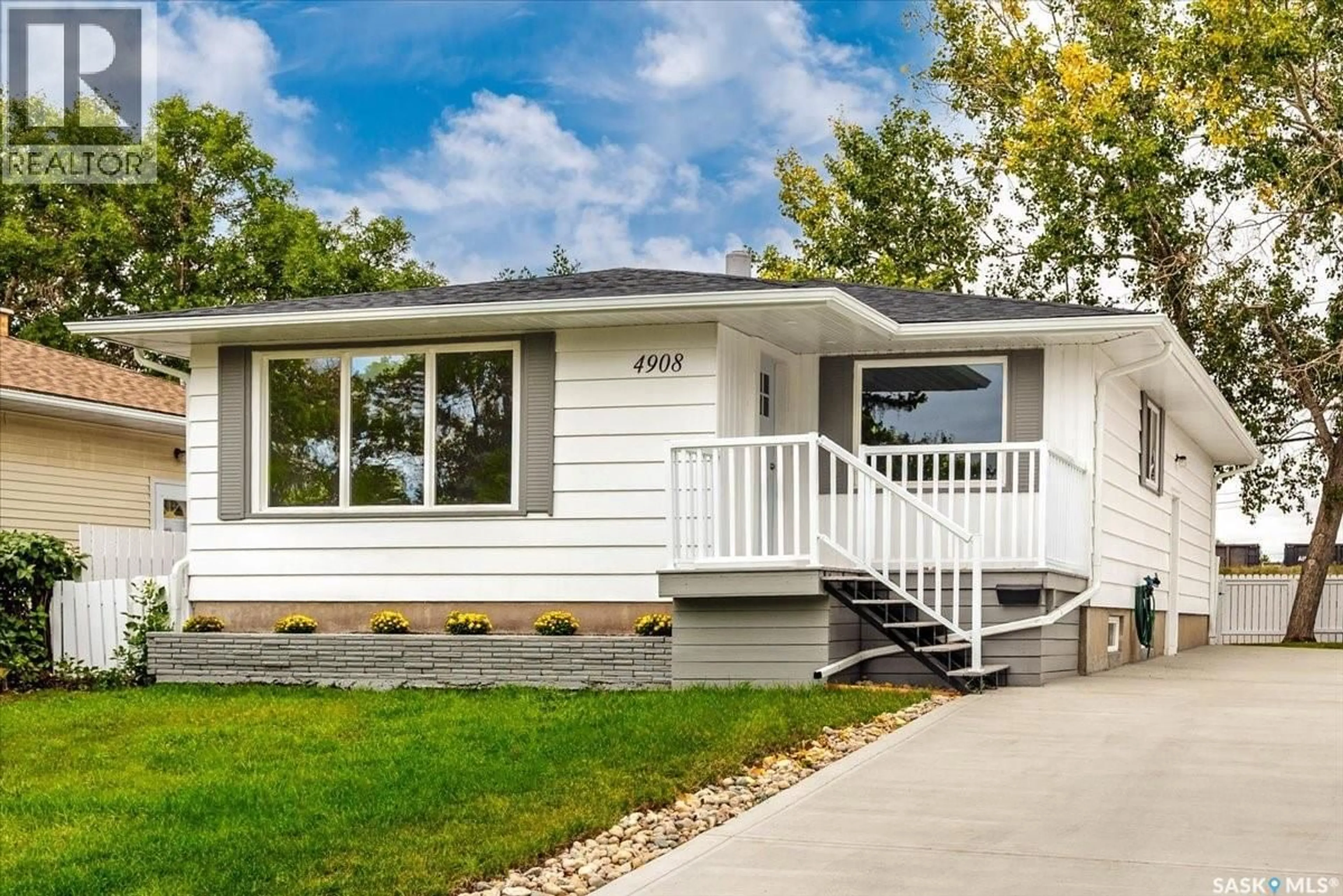 Home with vinyl exterior material, street for 4908 MCKINLEY AVENUE, Regina Saskatchewan S4T0A1