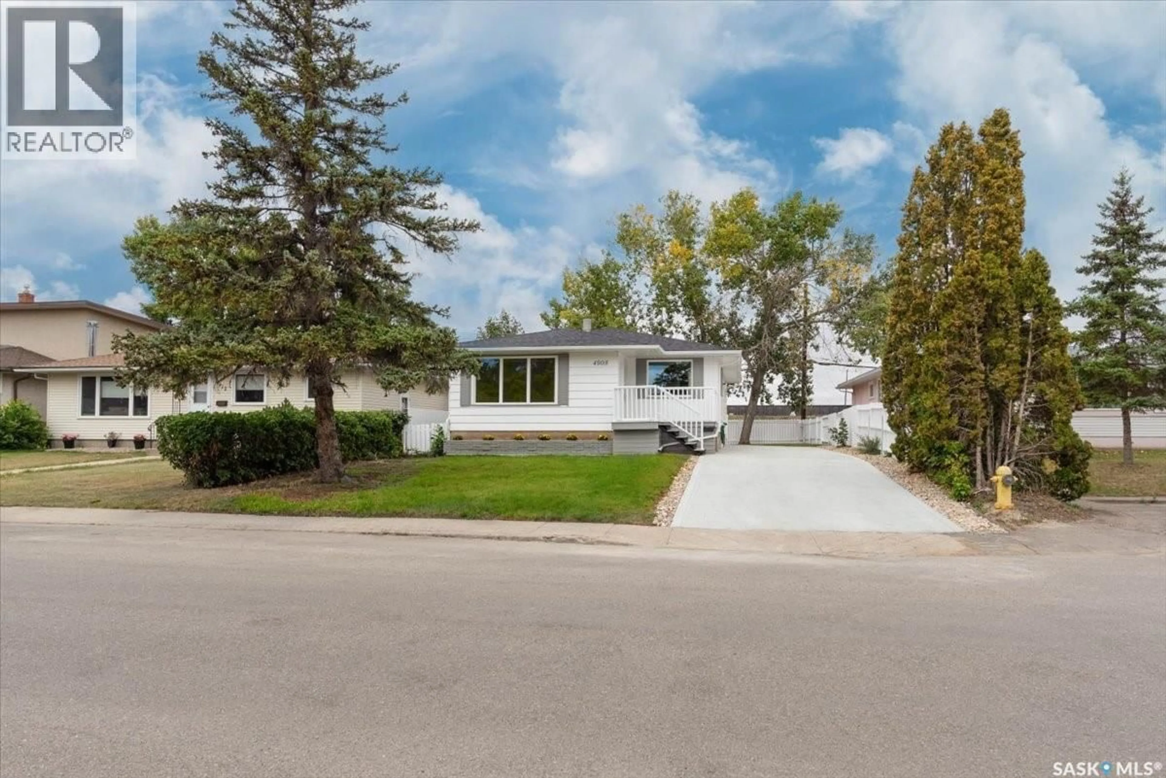 Home with vinyl exterior material, street for 4908 MCKINLEY AVENUE, Regina Saskatchewan S4T0A1