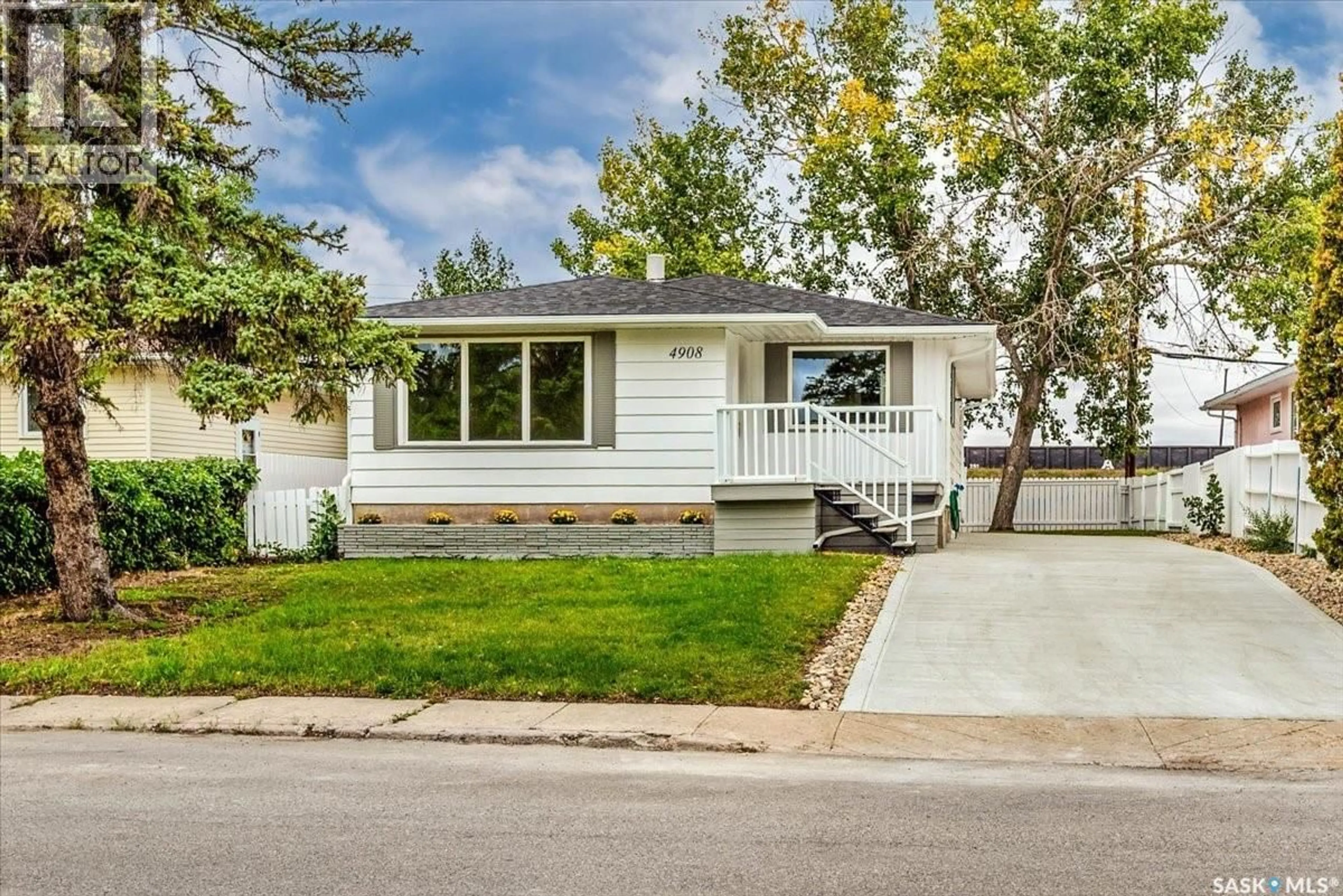 Home with vinyl exterior material, street for 4908 MCKINLEY AVENUE, Regina Saskatchewan S4T0A1