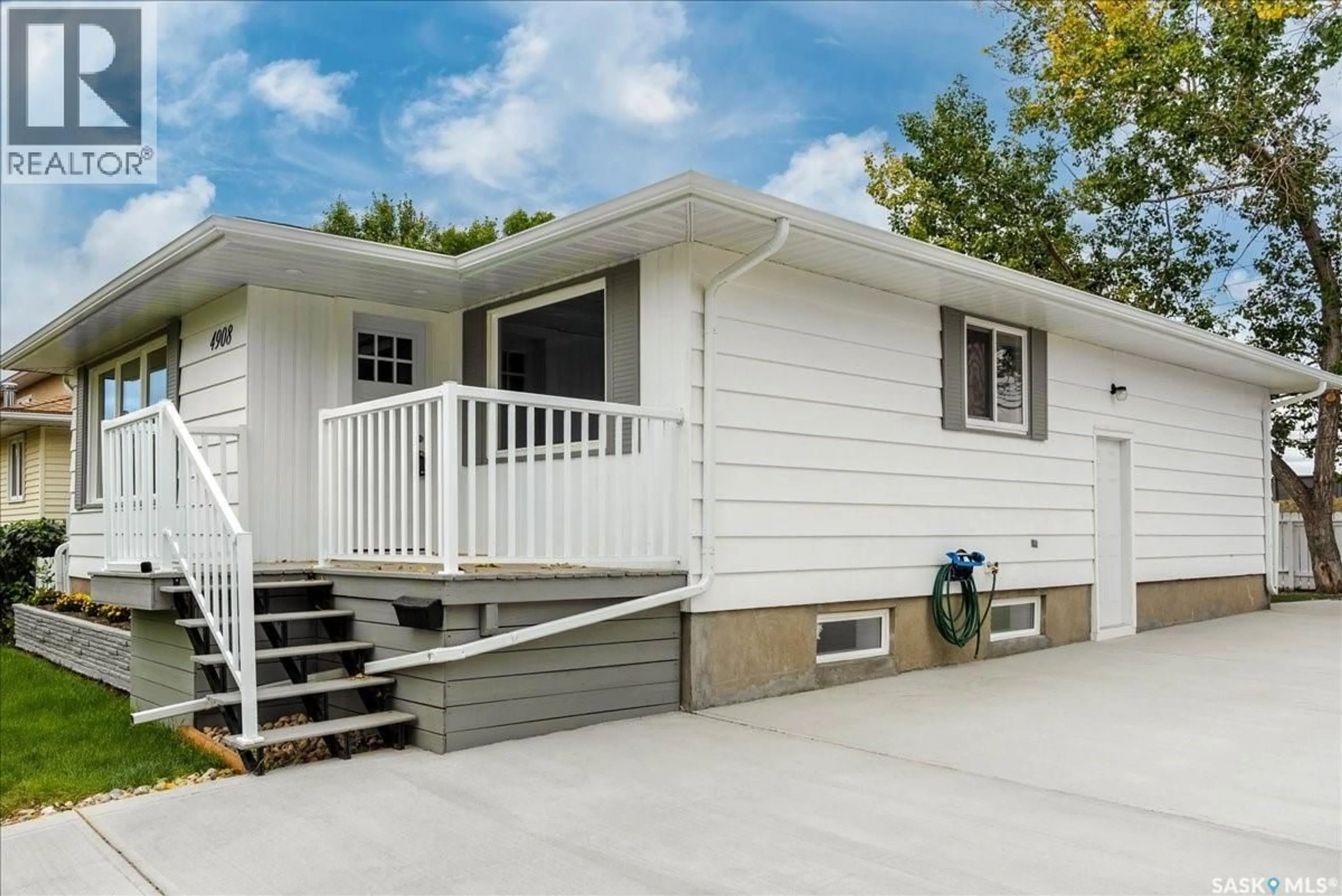 Home with vinyl exterior material, street for 4908 MCKINLEY AVENUE, Regina Saskatchewan S4T0A1