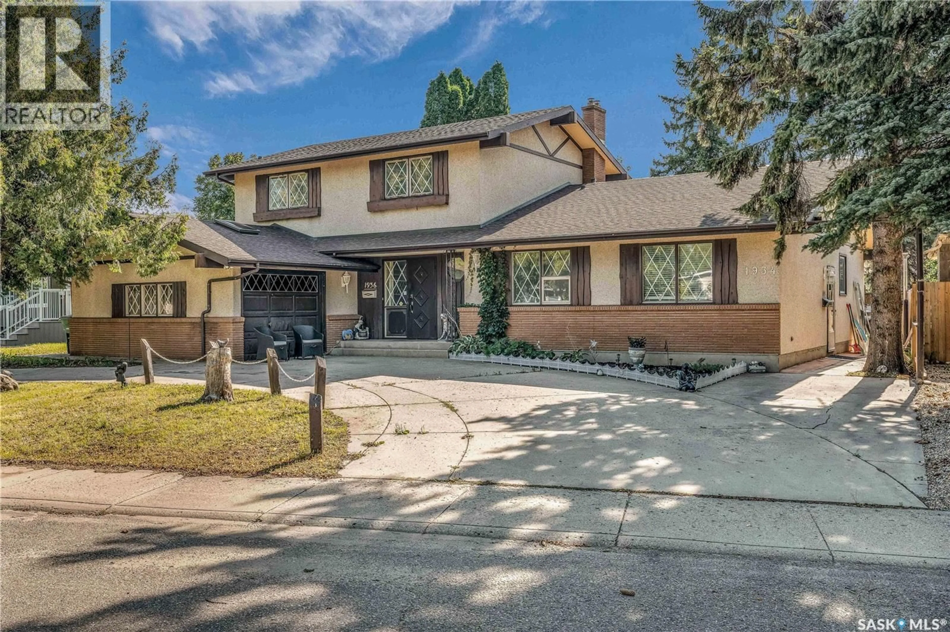 Home with brick exterior material, street for 1936 - 1934 EASTHILL, Saskatoon Saskatchewan S7J3C5