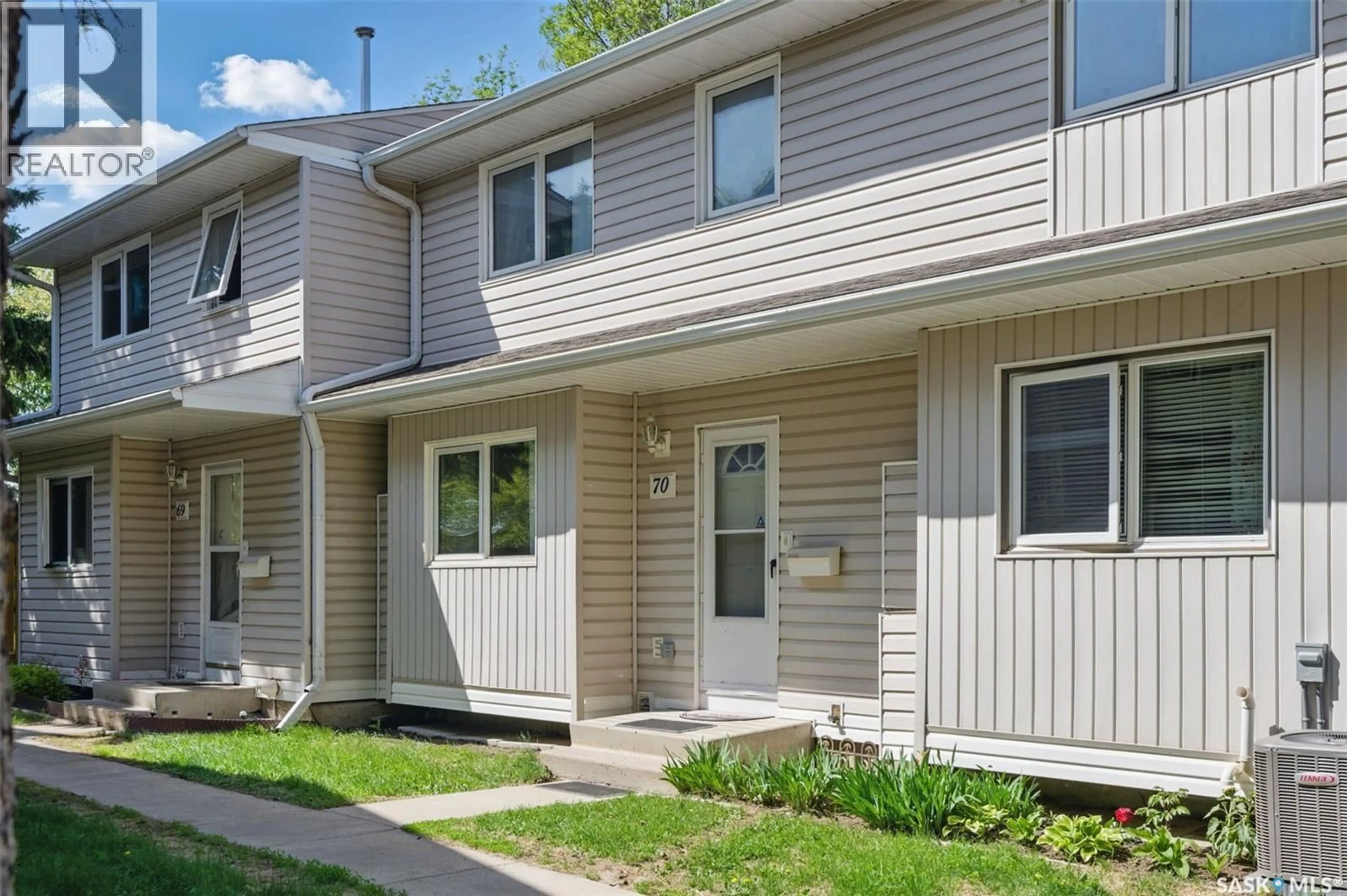 Home with vinyl exterior material, street for 70 330 HAIGHT CRESCENT, Saskatoon Saskatchewan S7H4V9