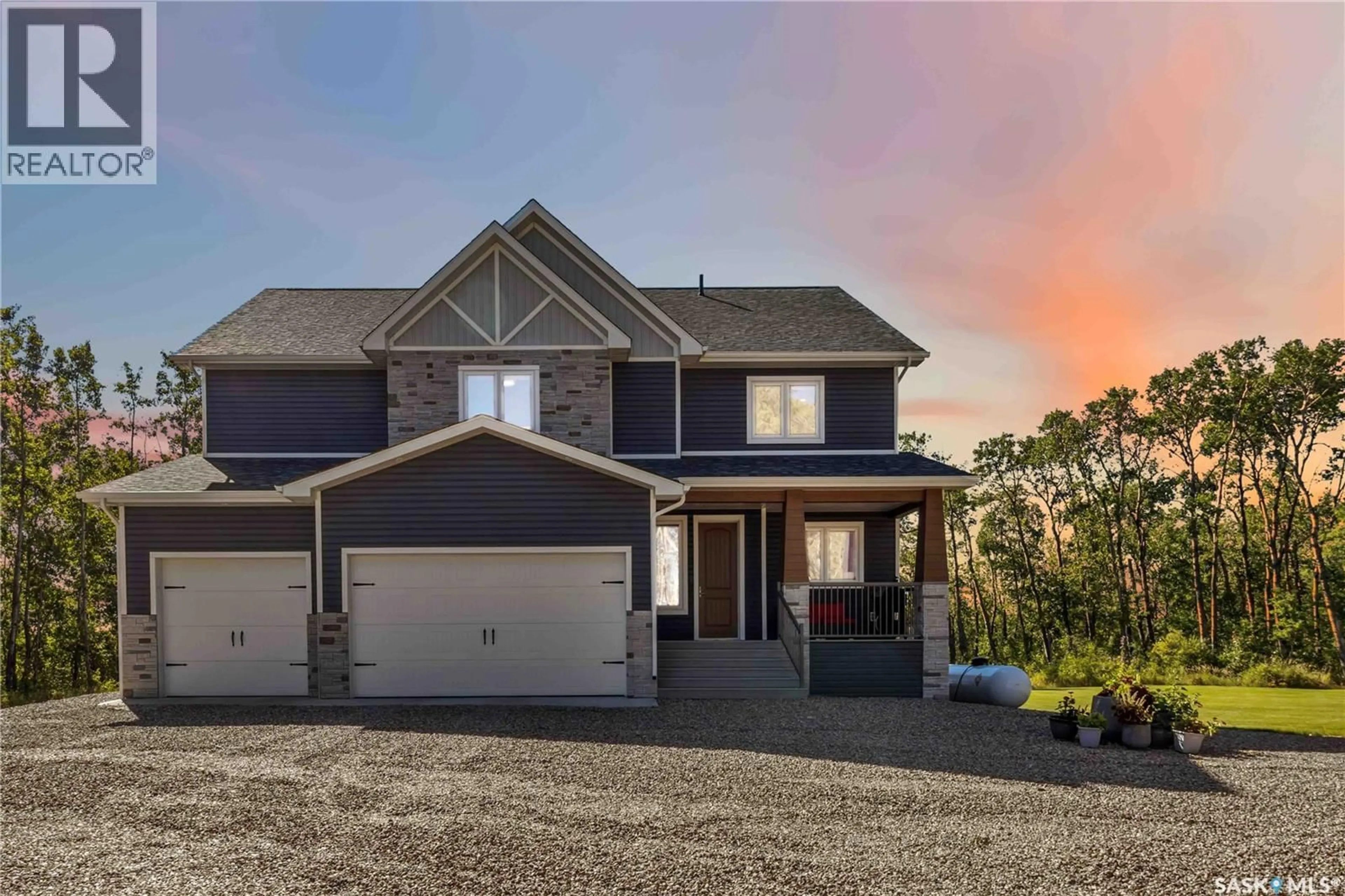 Home with brick exterior material, street for Little Loon LAKEFRONT LUXURY, Parkdale Rm No. 498 Saskatchewan S0M0Y0