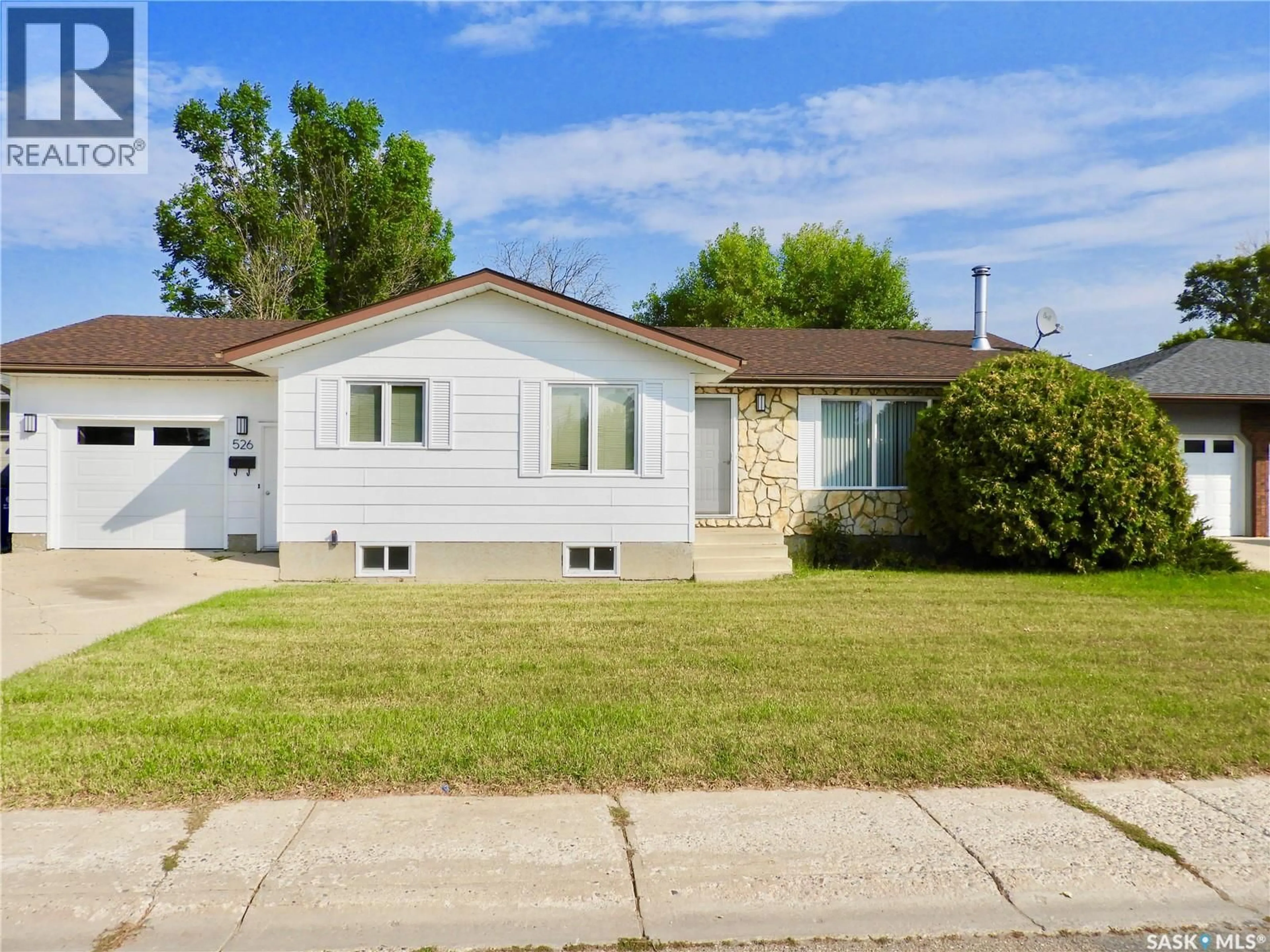 Home with vinyl exterior material, street for 526 WILKEN CRESCENT, Warman Saskatchewan S0K4S0