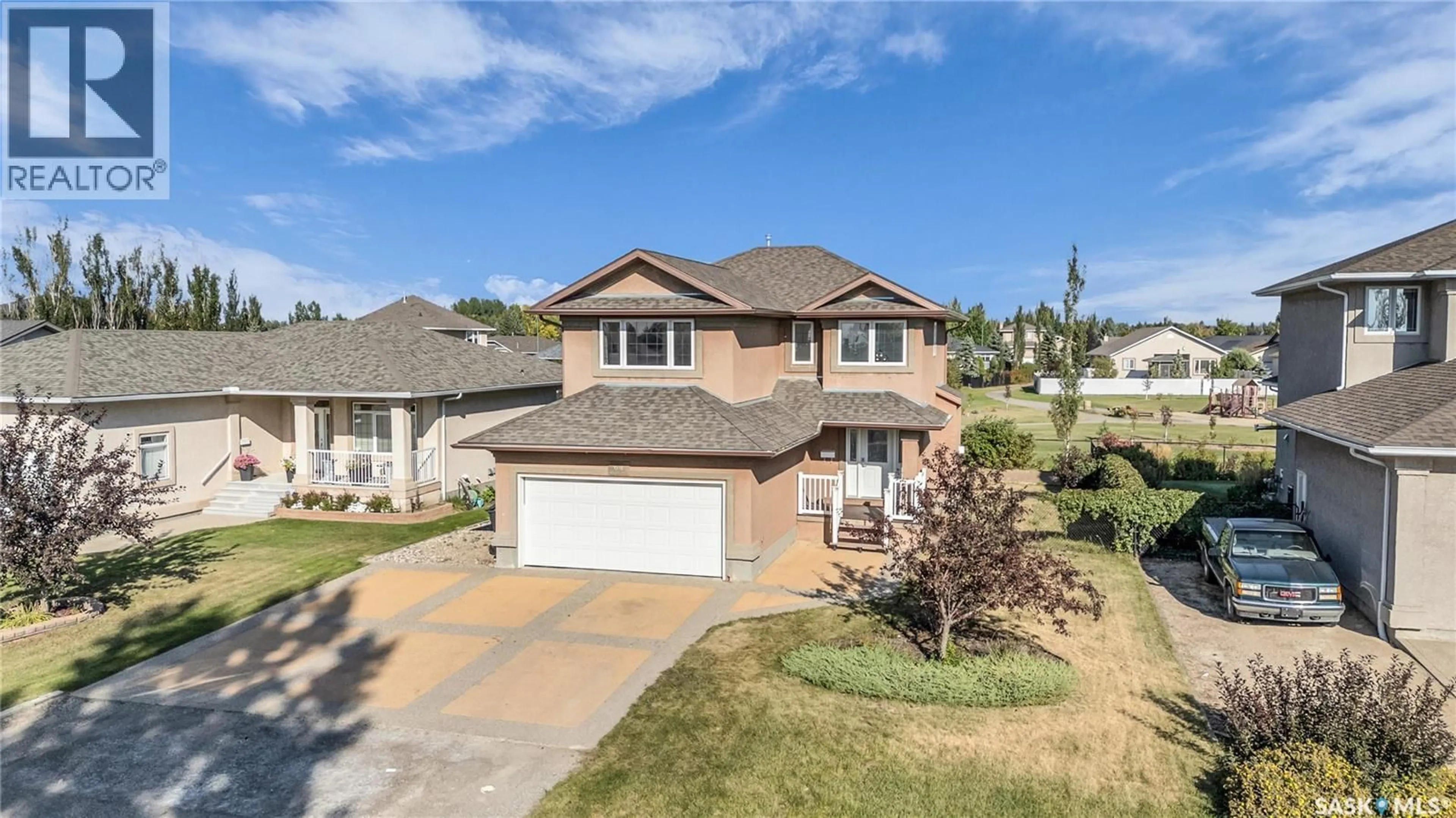 A pic from outside/outdoor area/front of a property/back of a property/a pic from drone, street for 64 WOODS CRESCENT, Edenwold Rm No.158 Saskatchewan S4L1C5