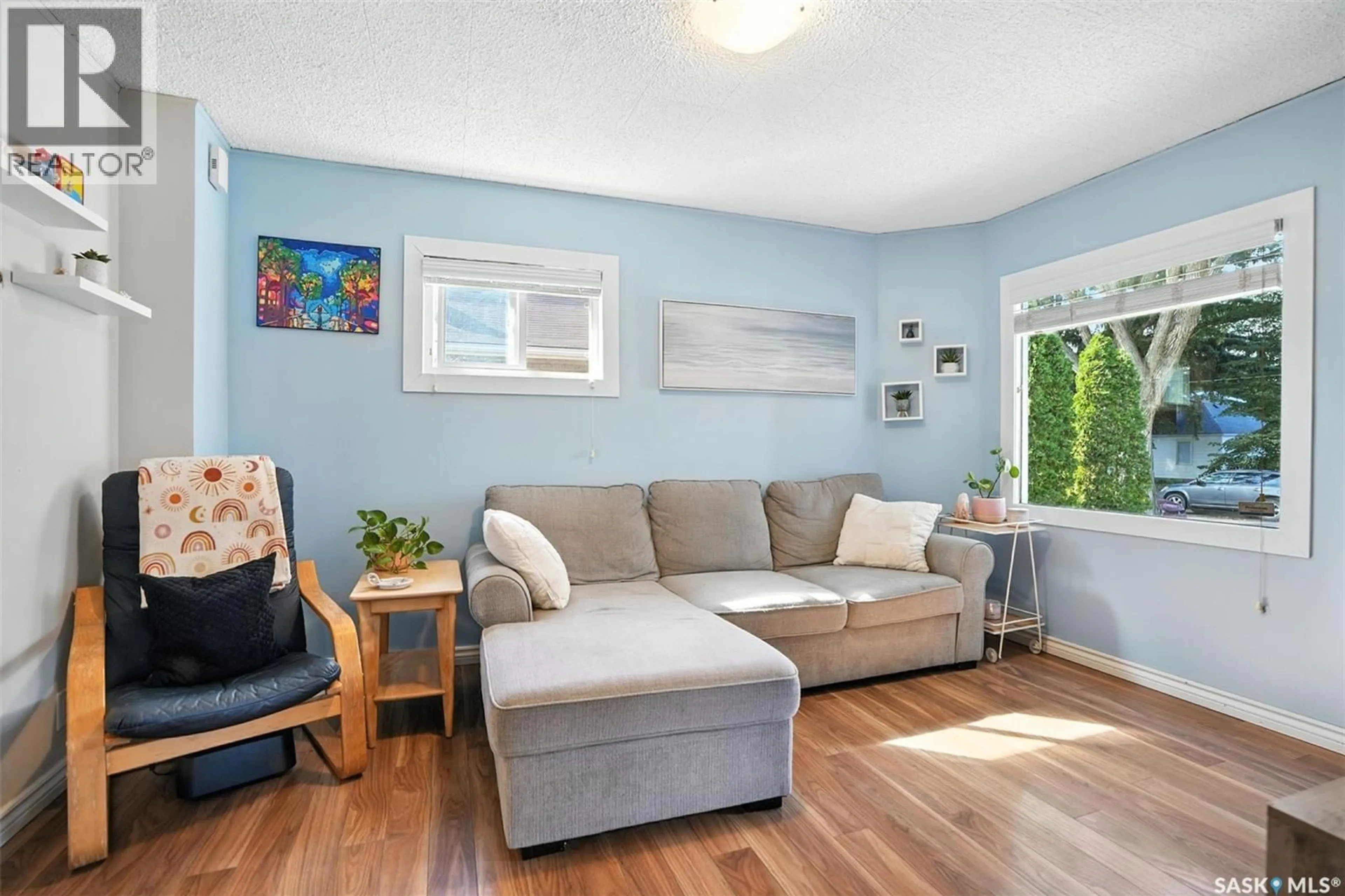 Living room with furniture, unknown for 210 ELM STREET, Saskatoon Saskatchewan S7J0G7