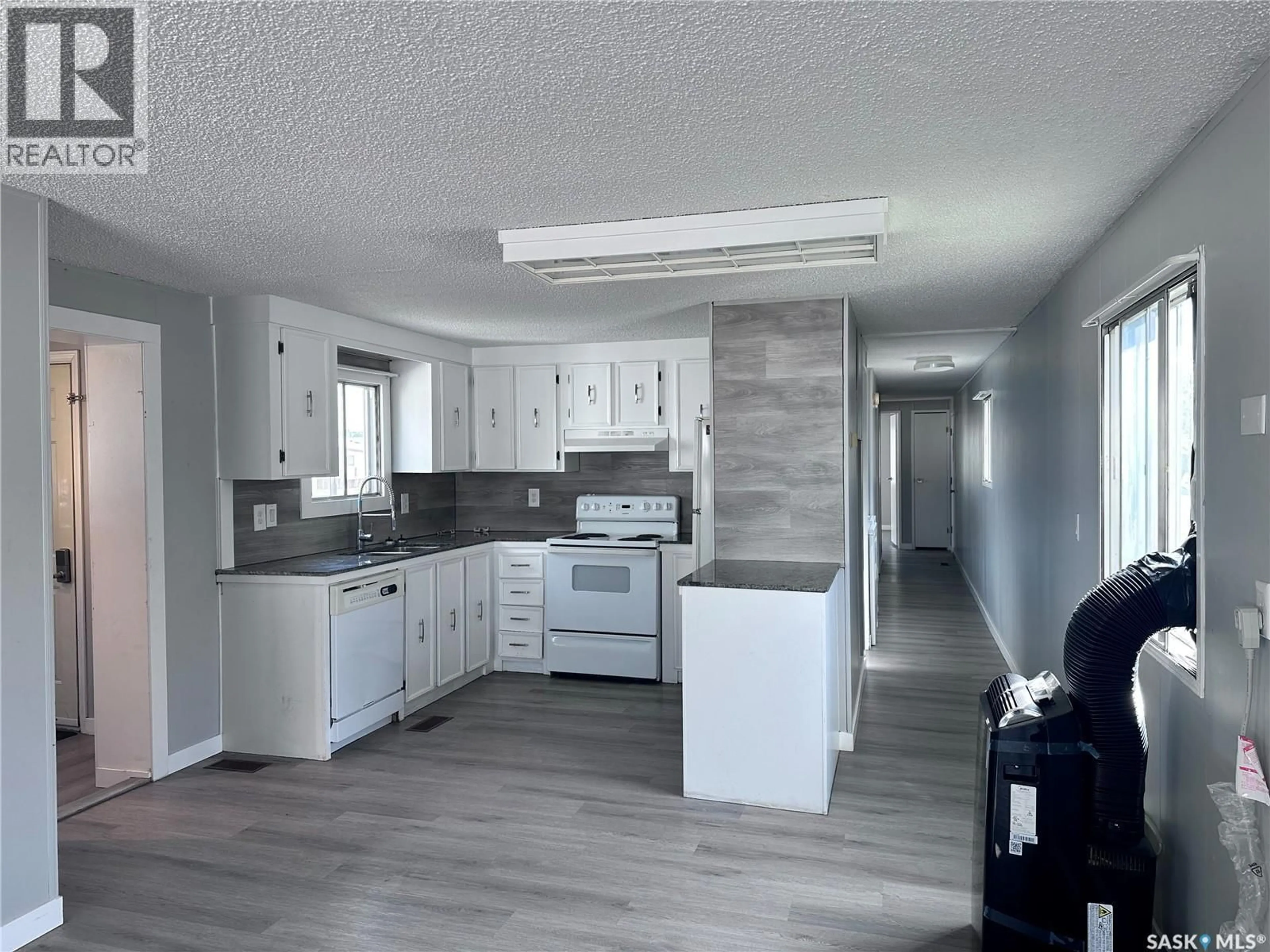 Open concept kitchen, unknown for 106 - 67 1ST AVENUE, Weyburn Saskatchewan S4H2J1