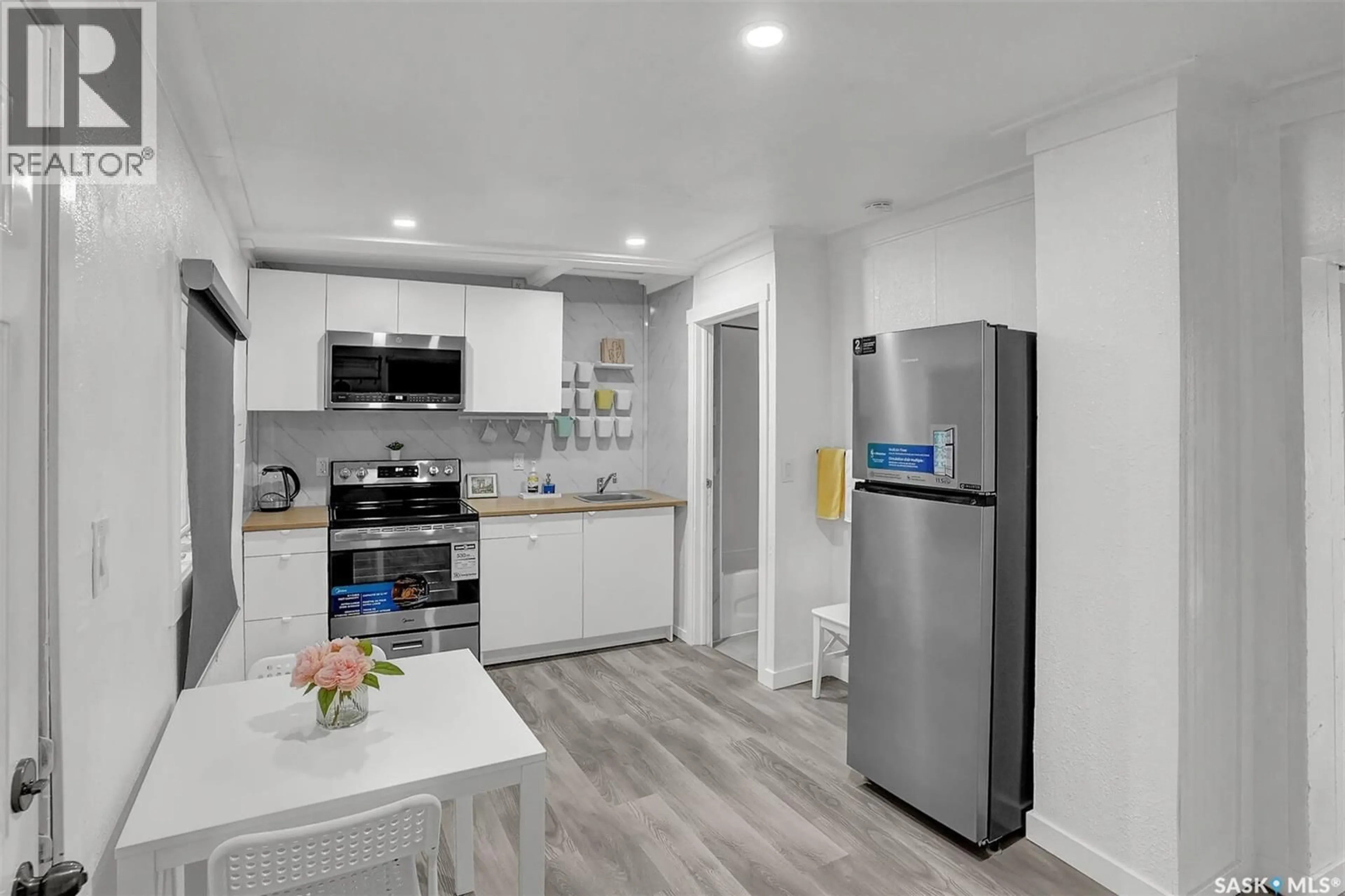 Open concept kitchen, unknown for 1668 OTTAWA STREET, Regina Saskatchewan S4P1N9