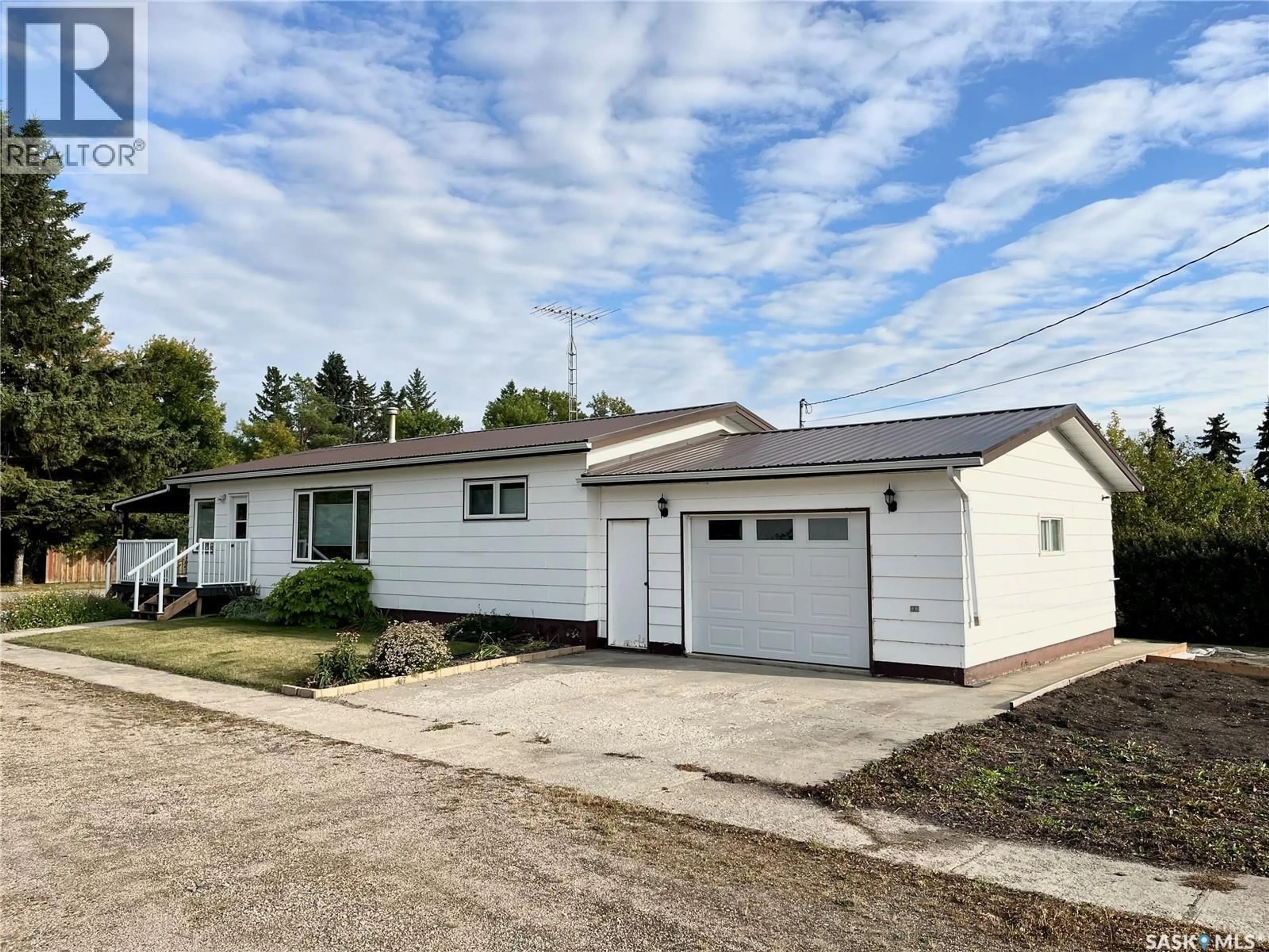Home with vinyl exterior material, street for 302 MAY STREET, Neudorf Saskatchewan S0A2T0
