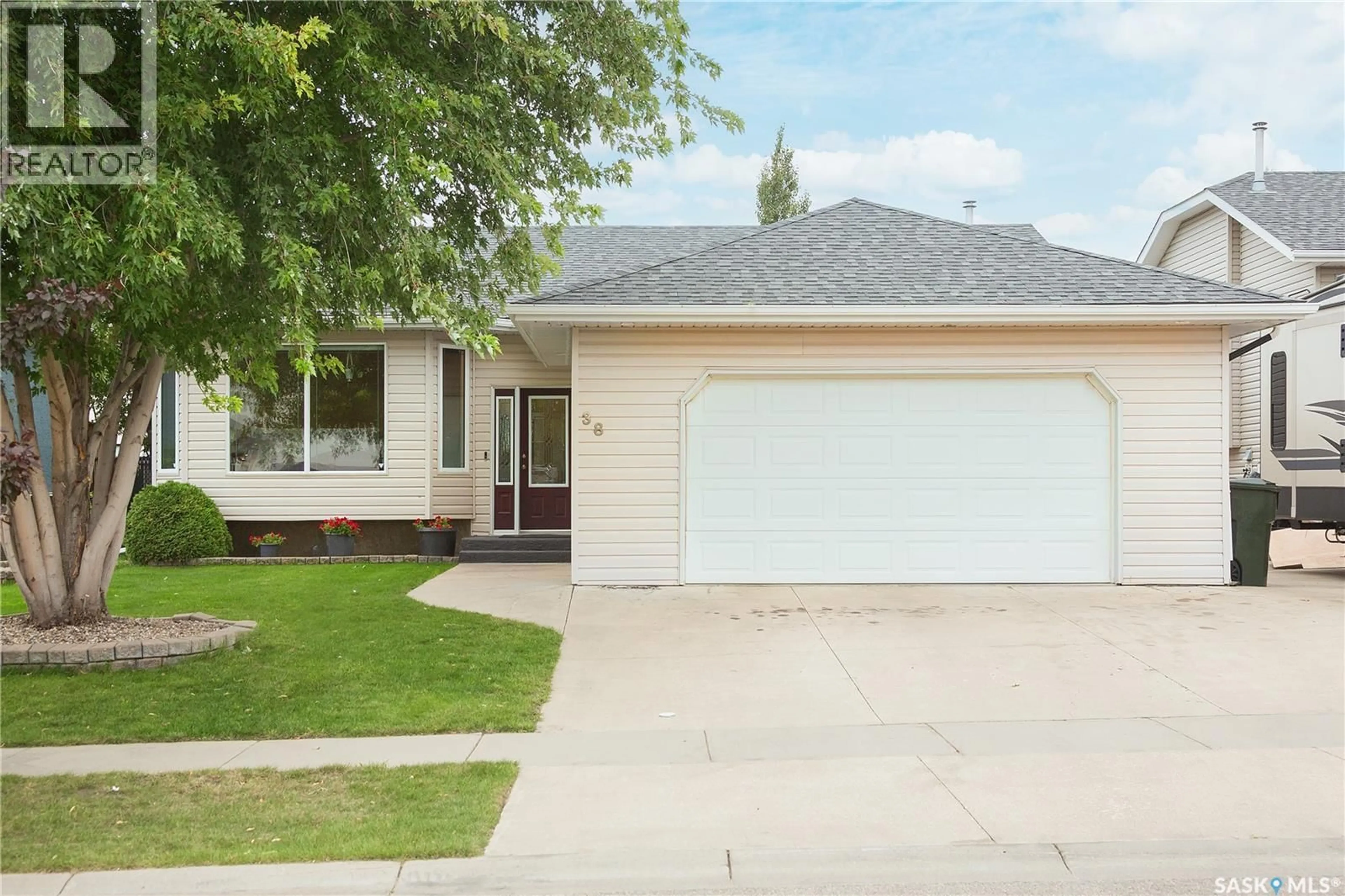 Home with vinyl exterior material, street for 38 LONGPRE CRESCENT, Prince Albert Saskatchewan S6X1C6
