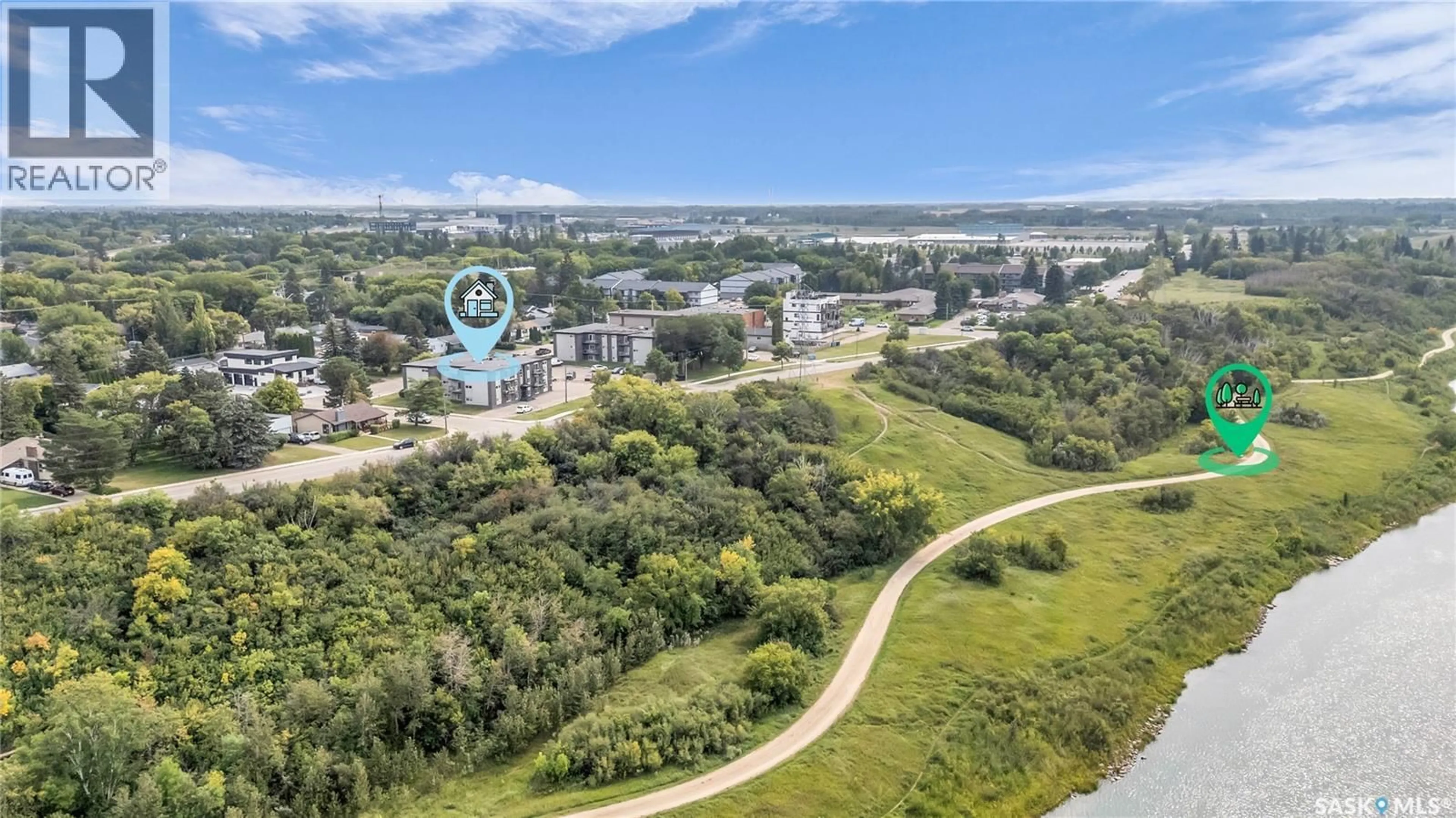 A pic from outside/outdoor area/front of a property/back of a property/a pic from drone, water/lake/river/ocean view for 15 2106 ST CECILIA AVENUE, Saskatoon Saskatchewan S7M0P2