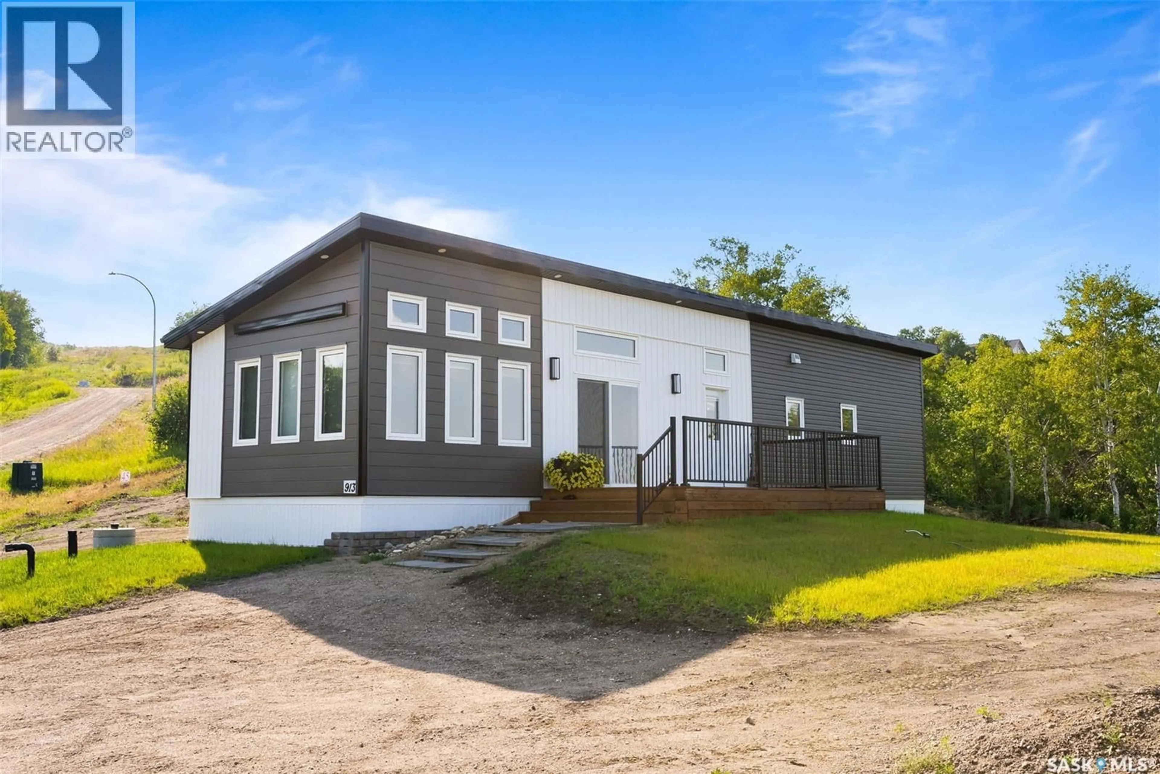 Home with vinyl exterior material, building for E - 913 PINCHERRY PLACE, Katepwa Beach Saskatchewan S0G1S0