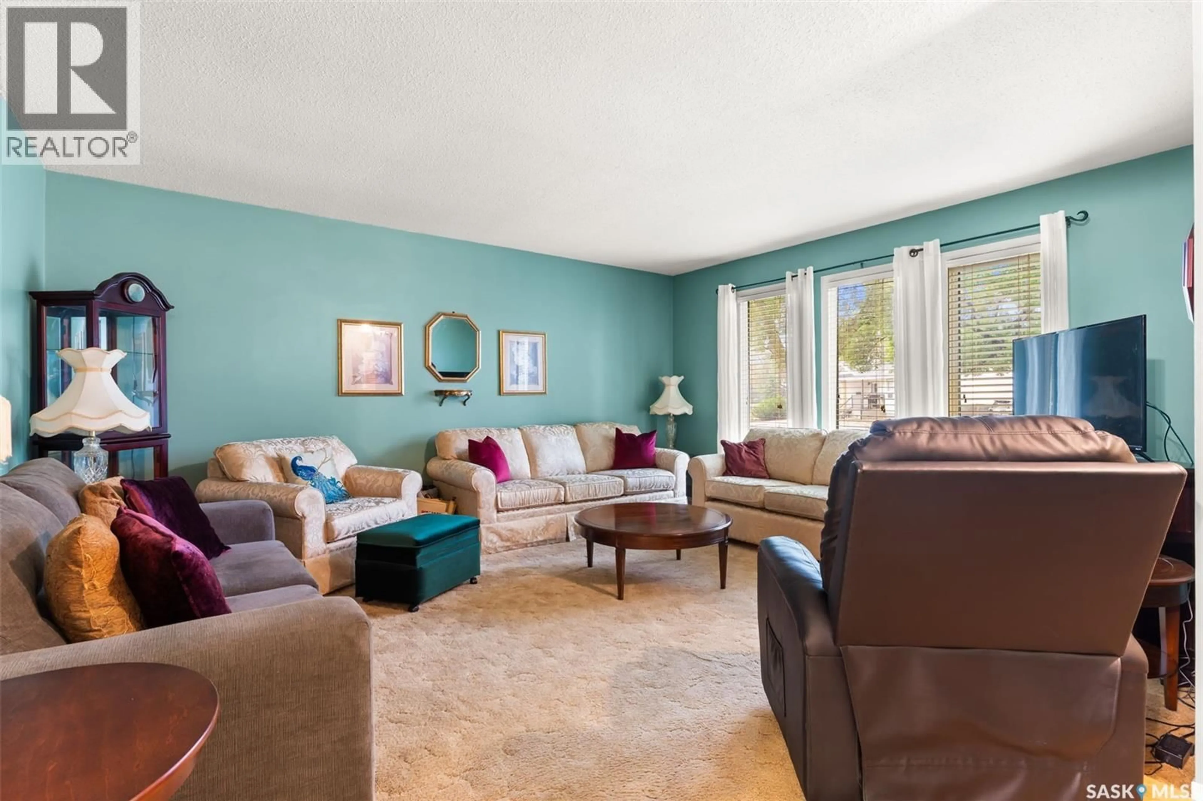 Living room with furniture, unknown for 14 HAMMOND ROAD, Regina Saskatchewan S4R3C6
