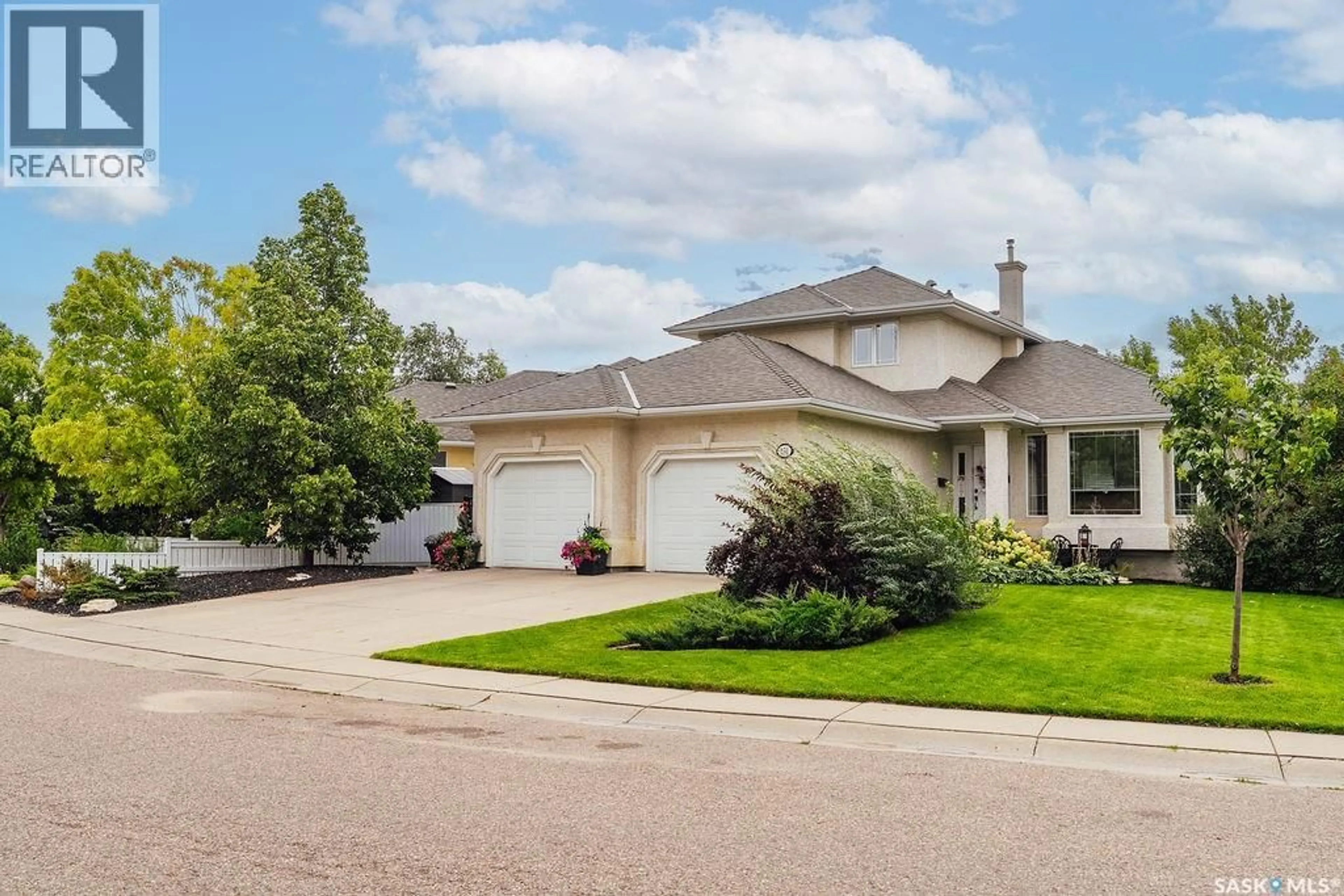 Home with vinyl exterior material, street for 231 BROOKMORE LANE, Saskatoon Saskatchewan S7V1C2