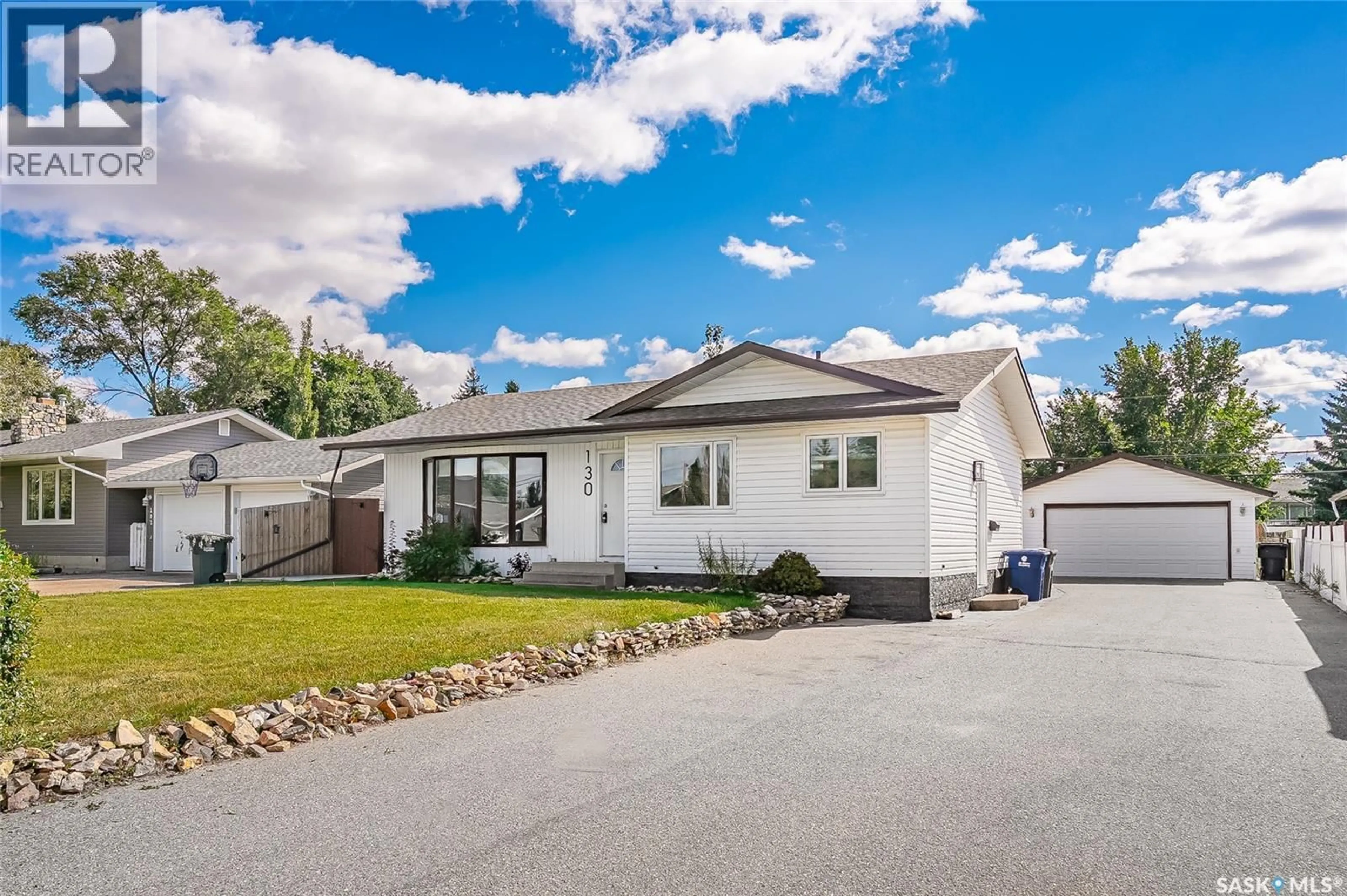 Home with vinyl exterior material, street for 130 MAIN STREET, Martensville Saskatchewan S0K2T0