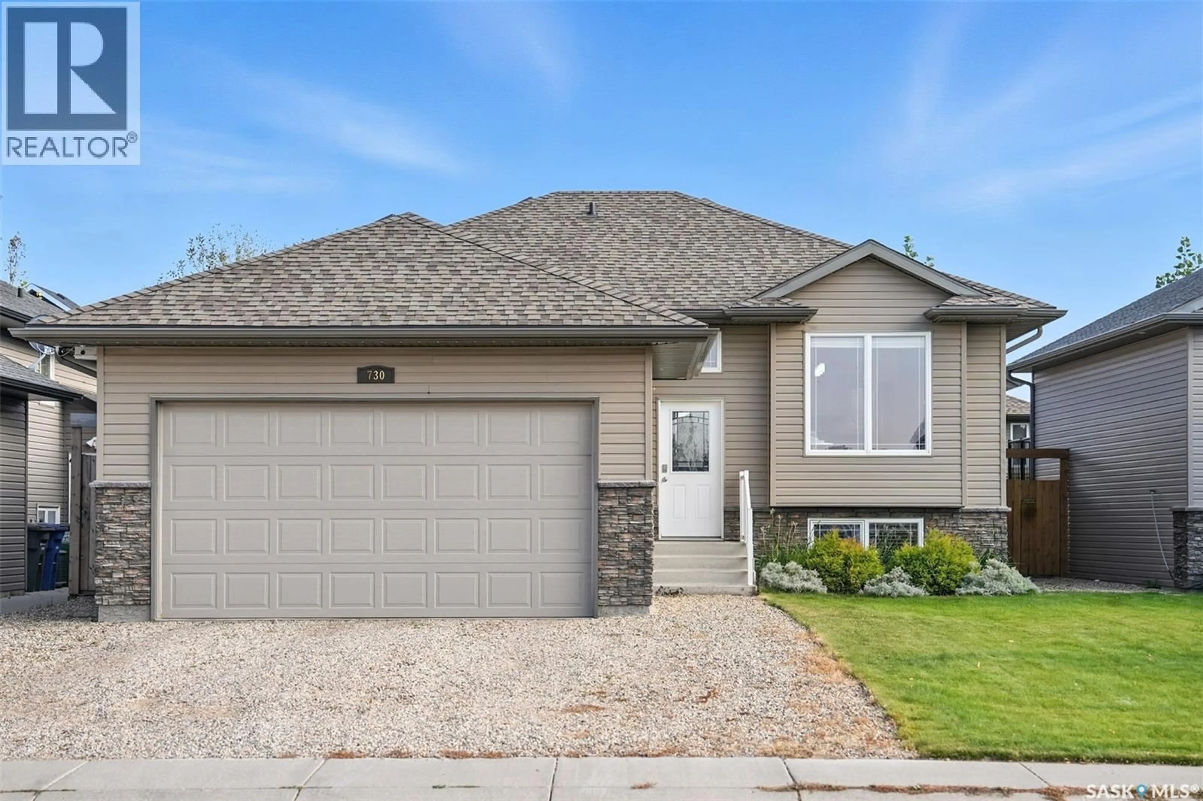 Home with vinyl exterior material, street for 730 HARGREAVES CRESCENT, Saskatoon Saskatchewan S7R0H2
