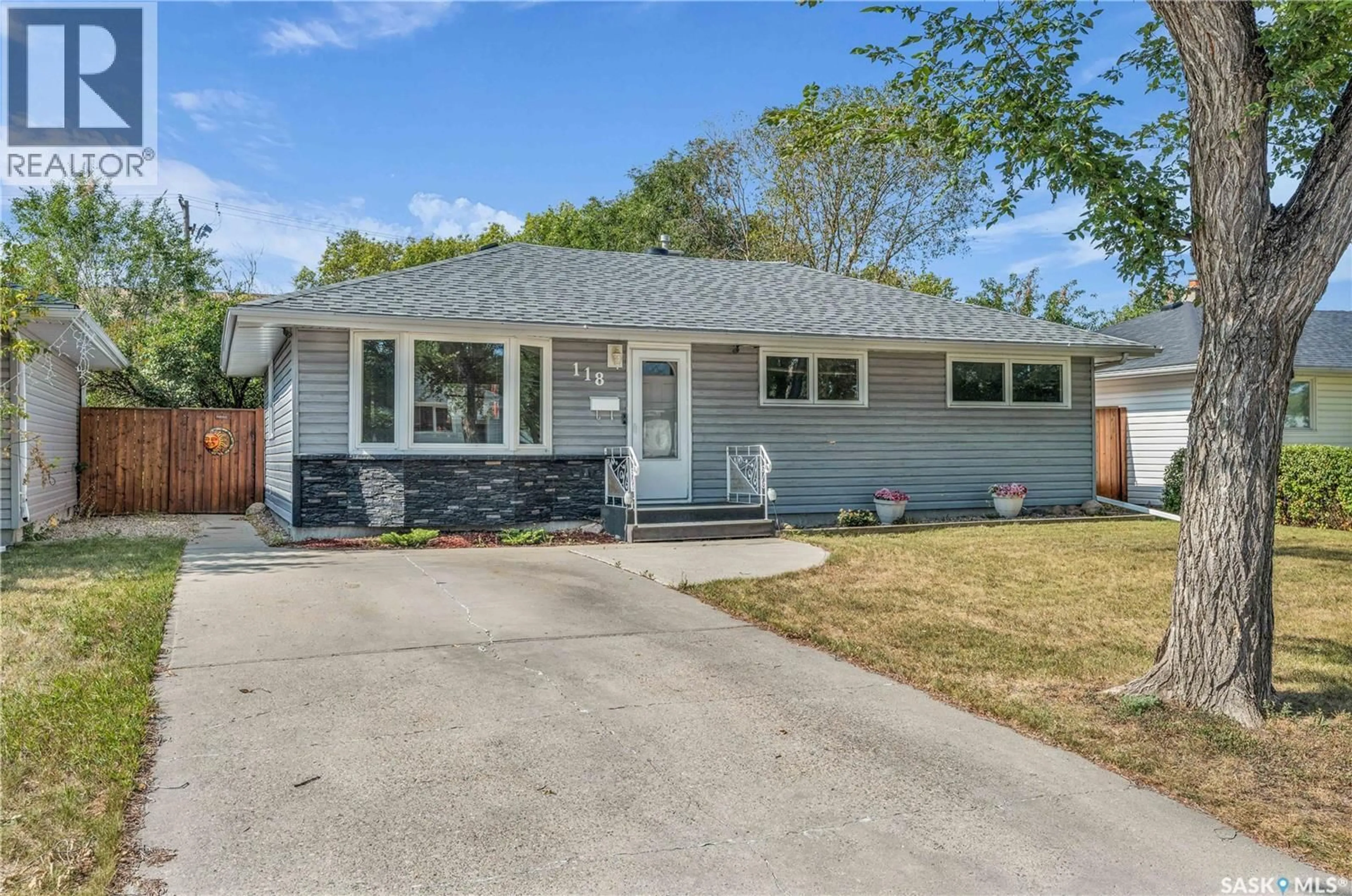 Home with vinyl exterior material, street for 118 CORNWALL STREET, Regina Saskatchewan S4R2G2