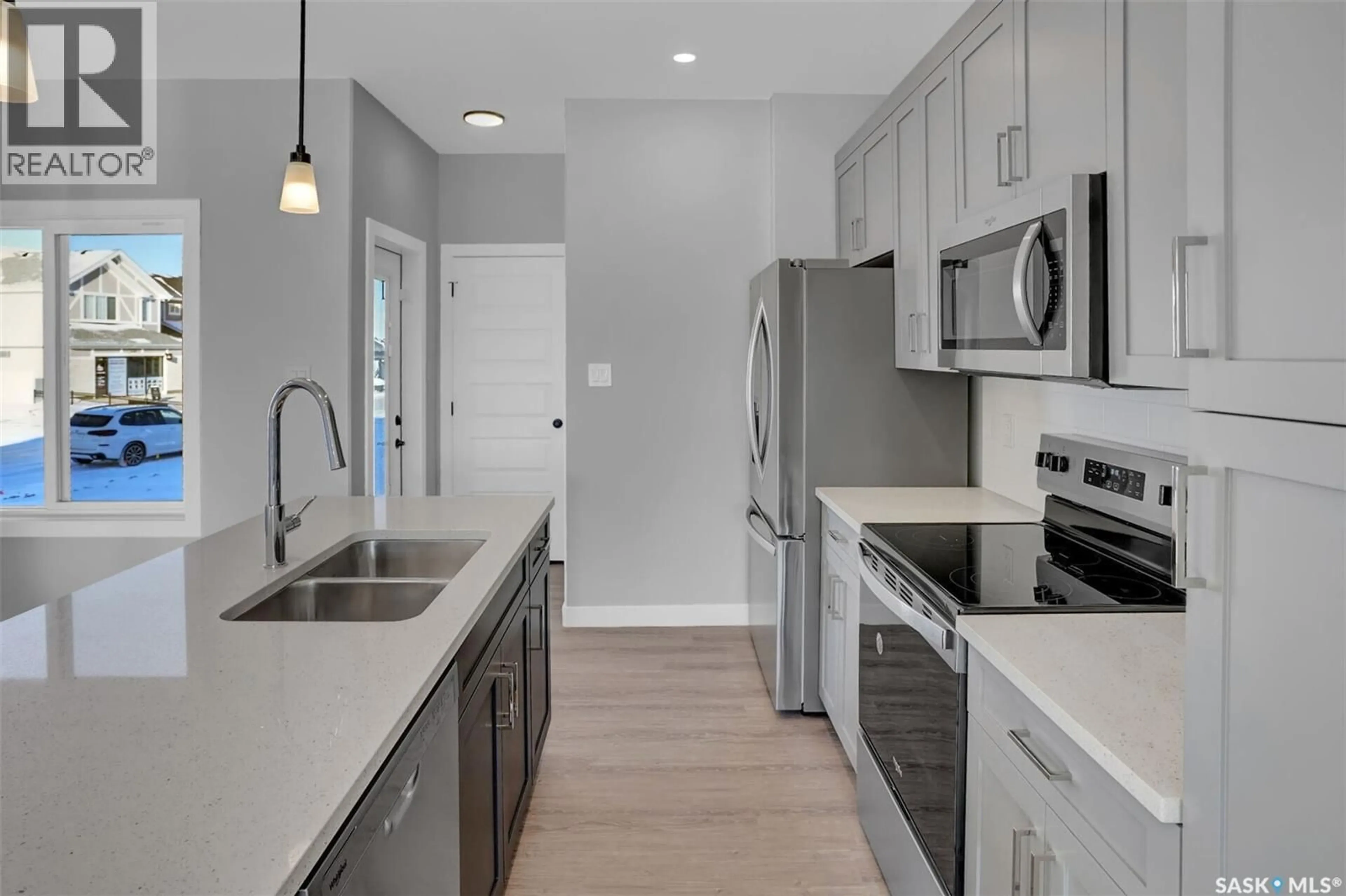 Open concept kitchen, ceramic/tile floor for 3136 GREEN TURTLE ROAD, Regina Saskatchewan S4N7K9