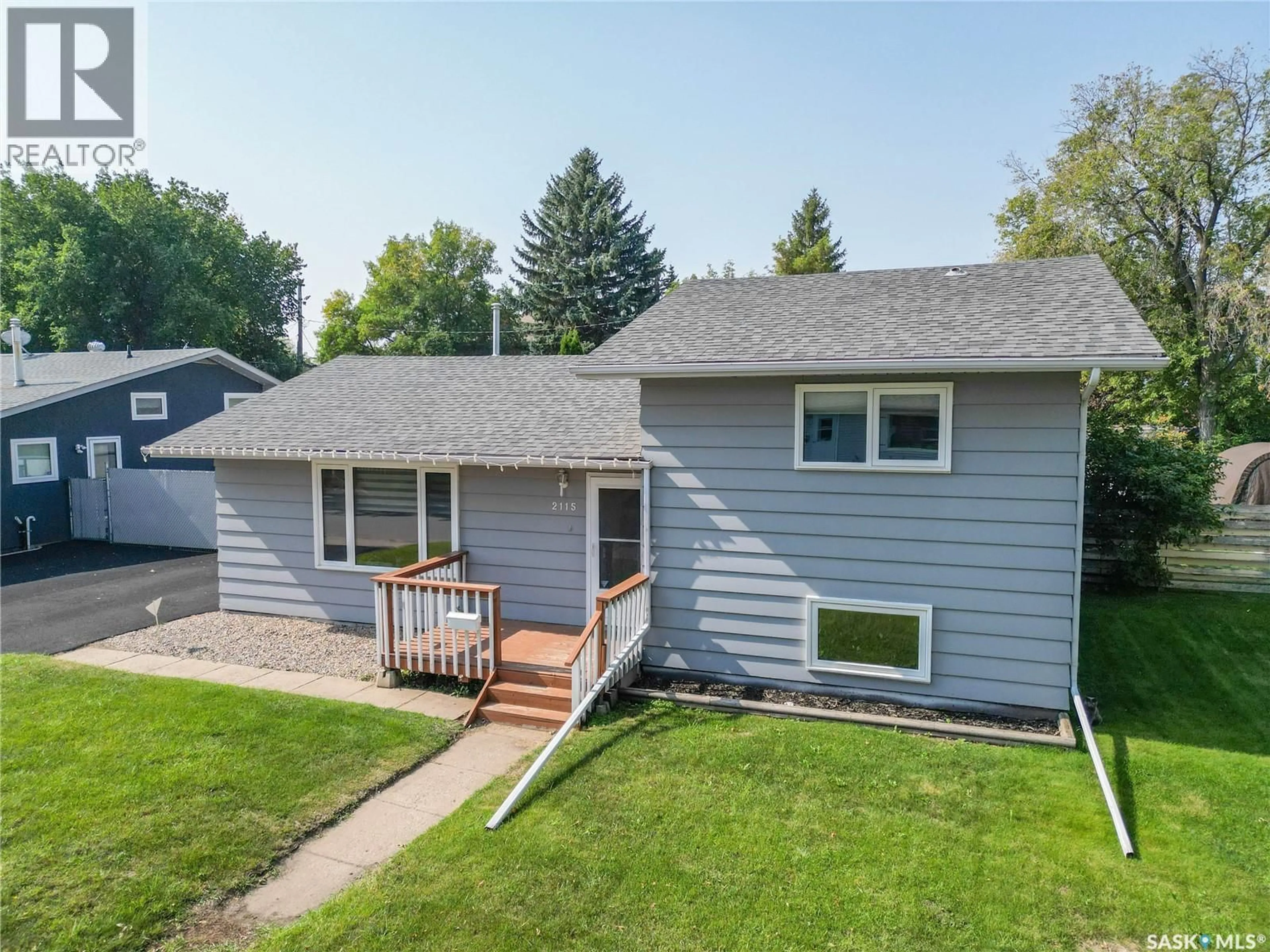 A pic from outside/outdoor area/front of a property/back of a property/a pic from drone, street for 2115 5A AVENUE W, Prince Albert Saskatchewan S6V5J5
