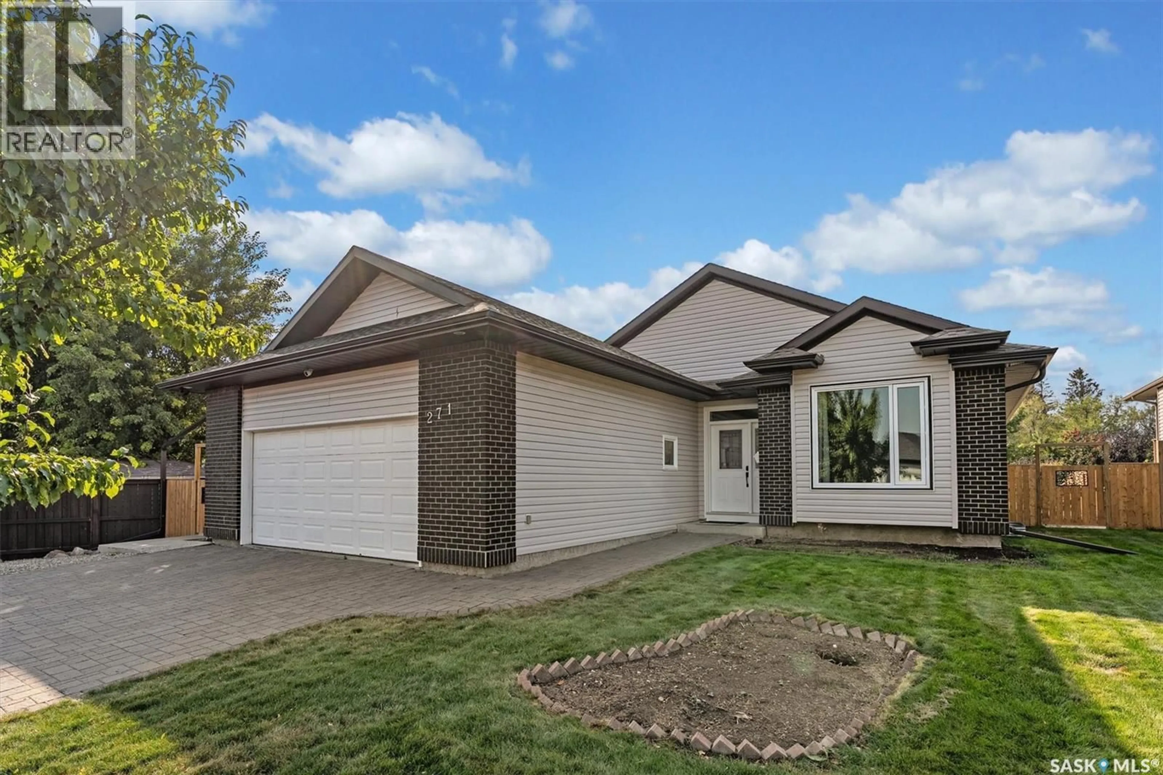 Home with brick exterior material, street for 271 DENHAM CRESCENT, Saskatoon Saskatchewan S7R1E5