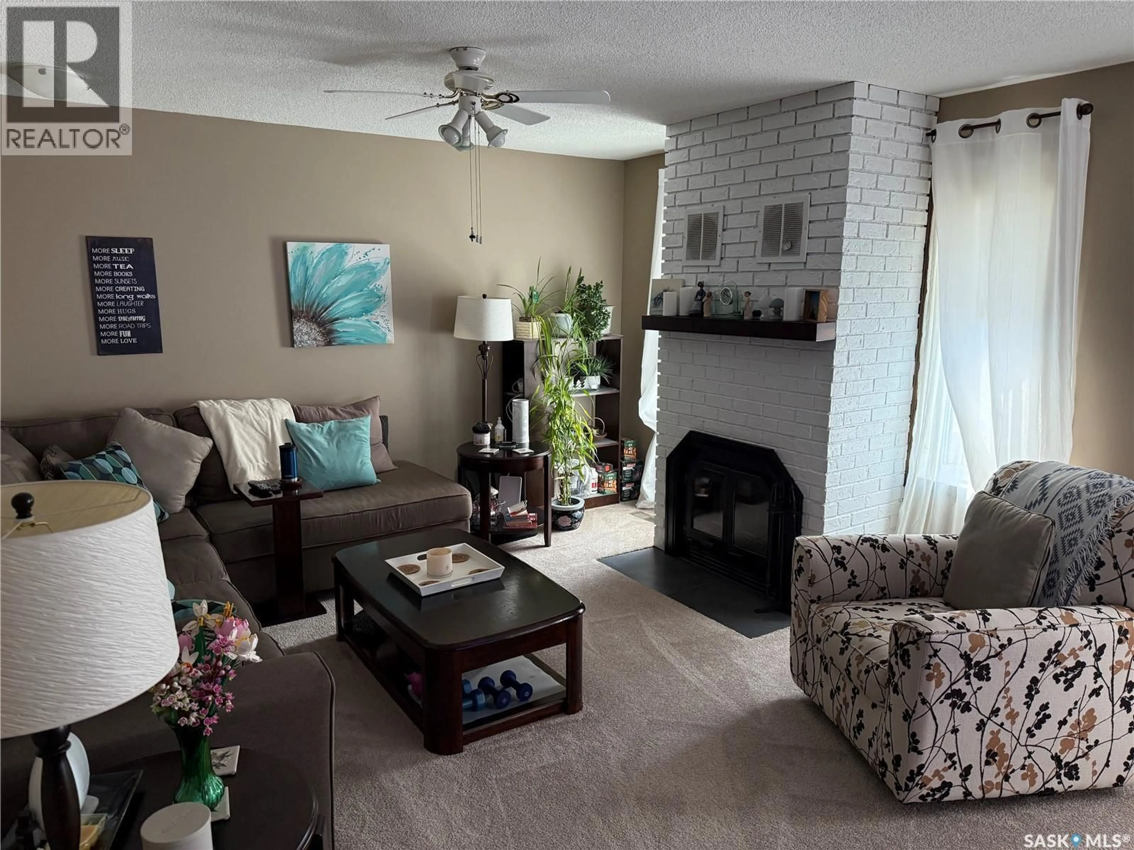 Living room with furniture, unknown for 15 MITCHELL CRESCENT, Weyburn Saskatchewan S4H2M3