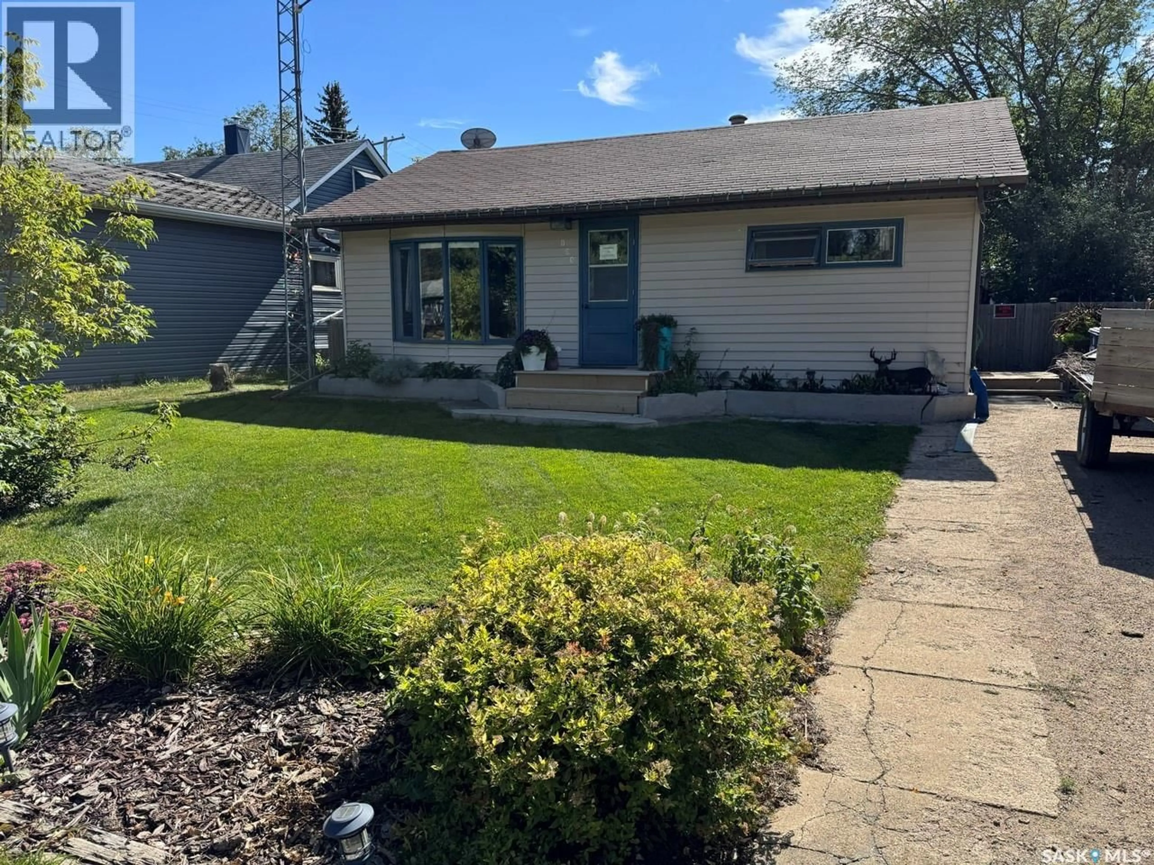 Home with vinyl exterior material, street for 103 3RD AVENUE, Maidstone Saskatchewan S0M1M0