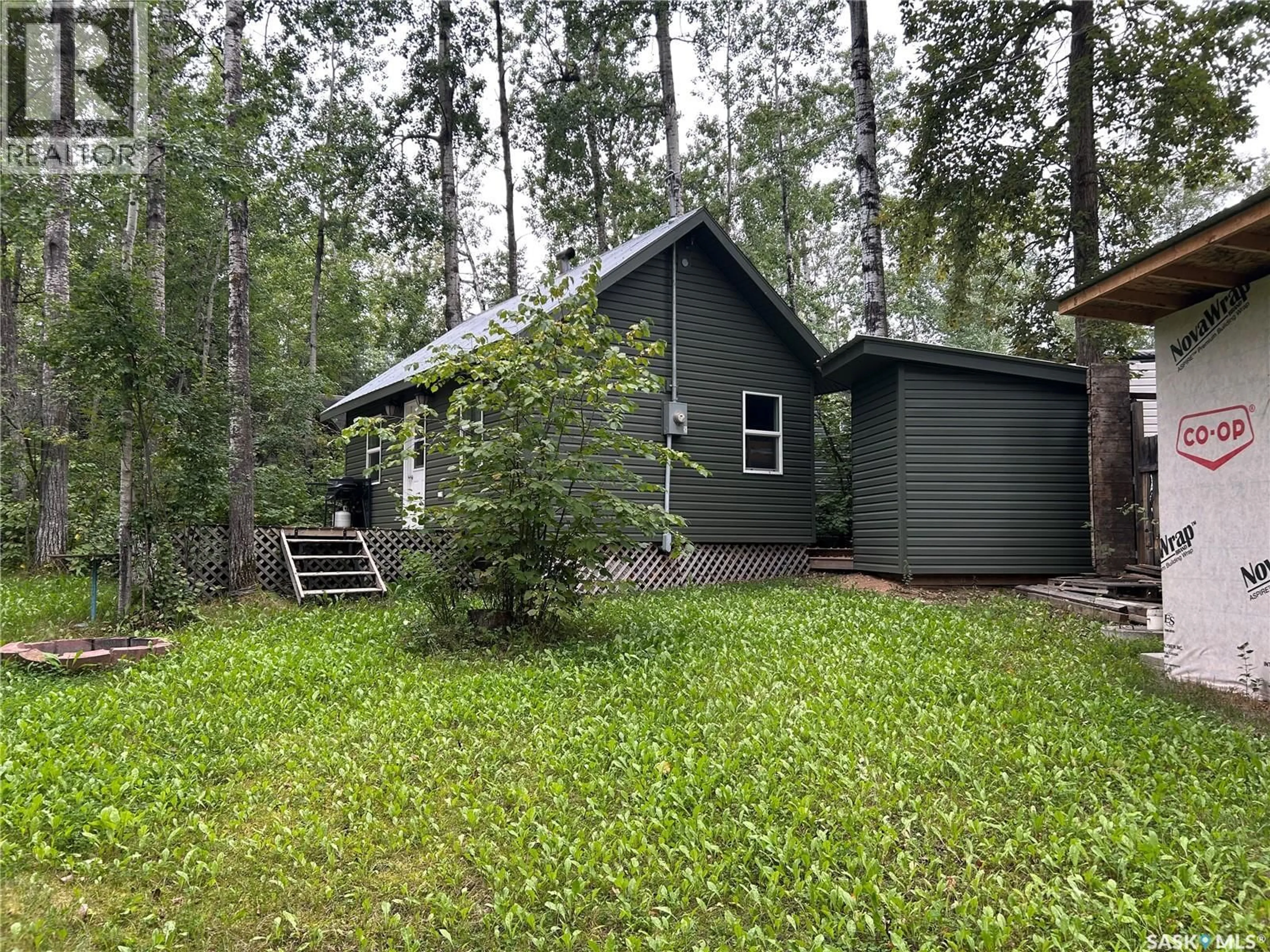 Home with vinyl exterior material, forest/trees view for 6030 SPRUCE WAY, Bjorkdale Rm No. 426 Saskatchewan S0E0E0