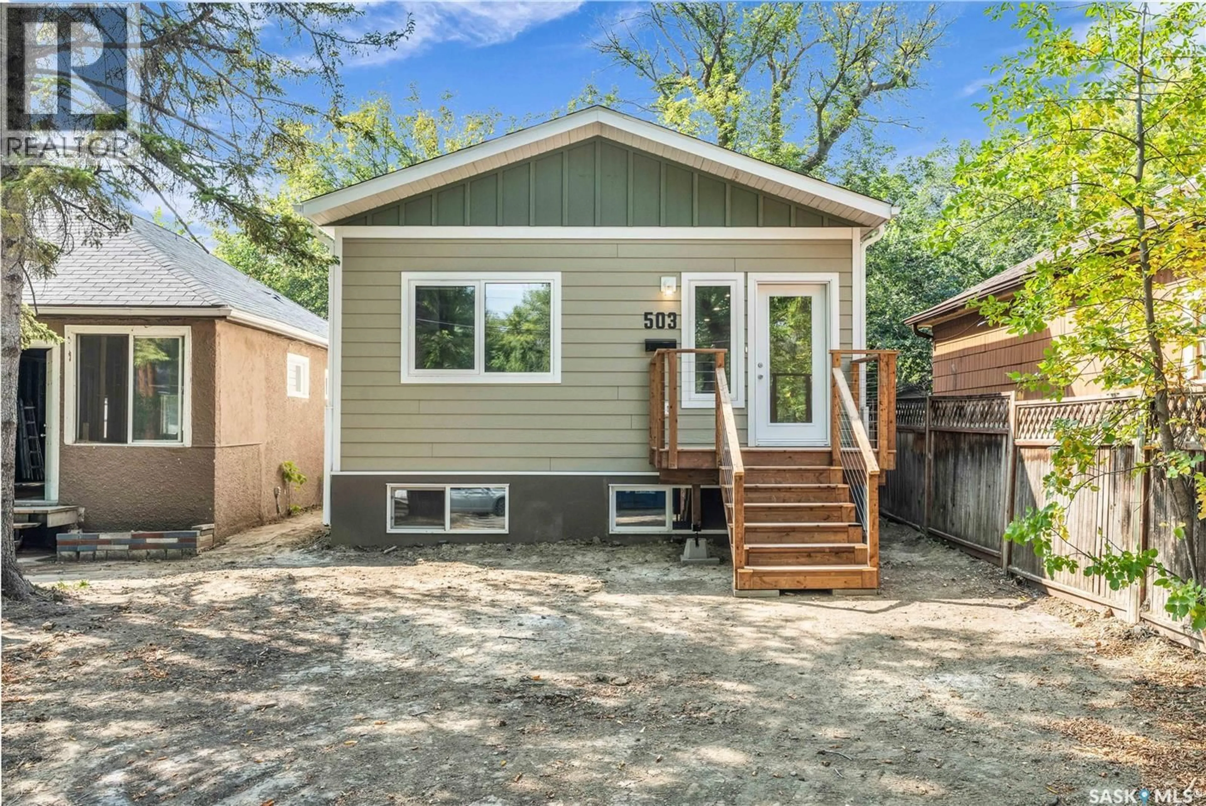 Home with vinyl exterior material, street for 503 F AVENUE, Saskatoon Saskatchewan S7L1W2