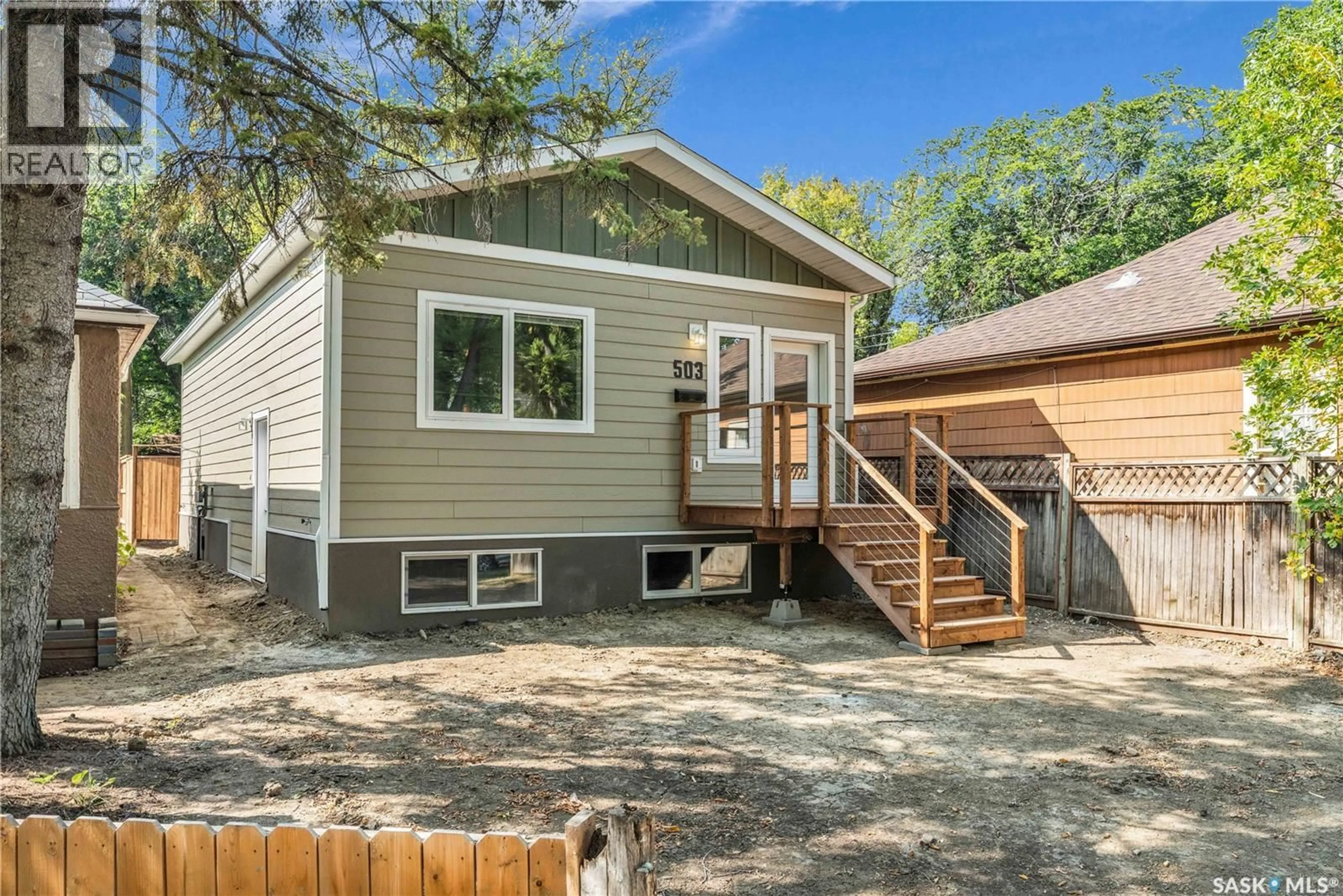 Home with vinyl exterior material, street for 503 F AVENUE, Saskatoon Saskatchewan S7L1W2