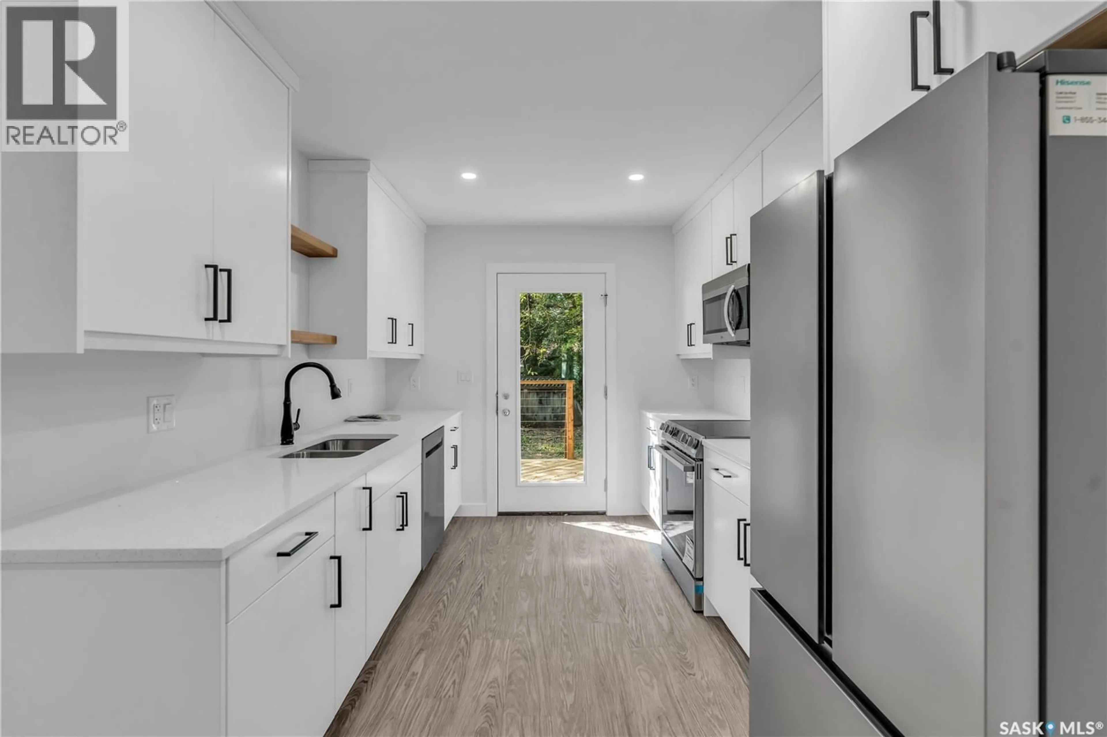 Open concept kitchen, ceramic/tile floor for 503 F AVENUE, Saskatoon Saskatchewan S7L1W2
