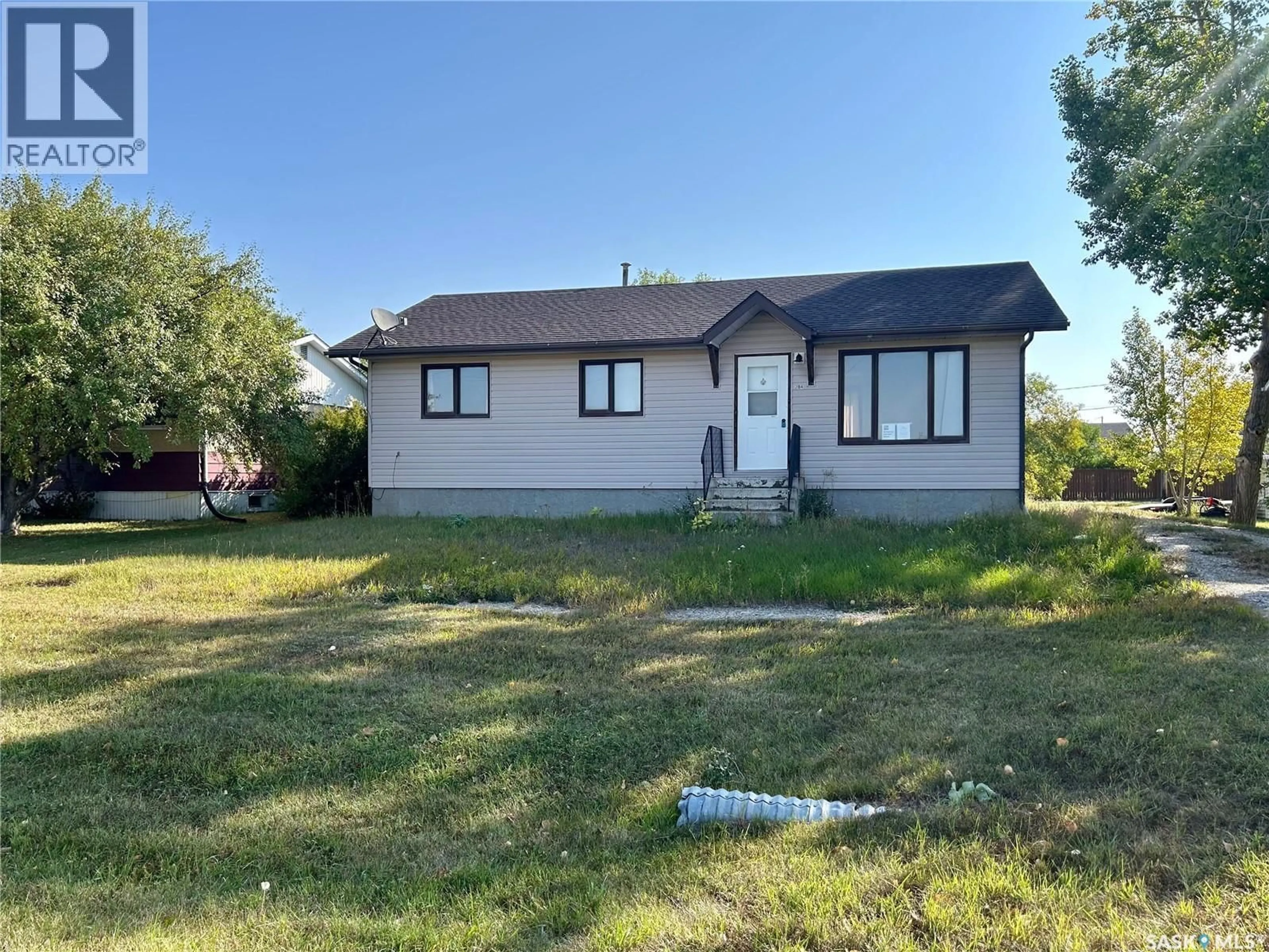 A pic from outside/outdoor area/front of a property/back of a property/a pic from drone, street for 204 1ST STREET, Lang Saskatchewan S0G2W0