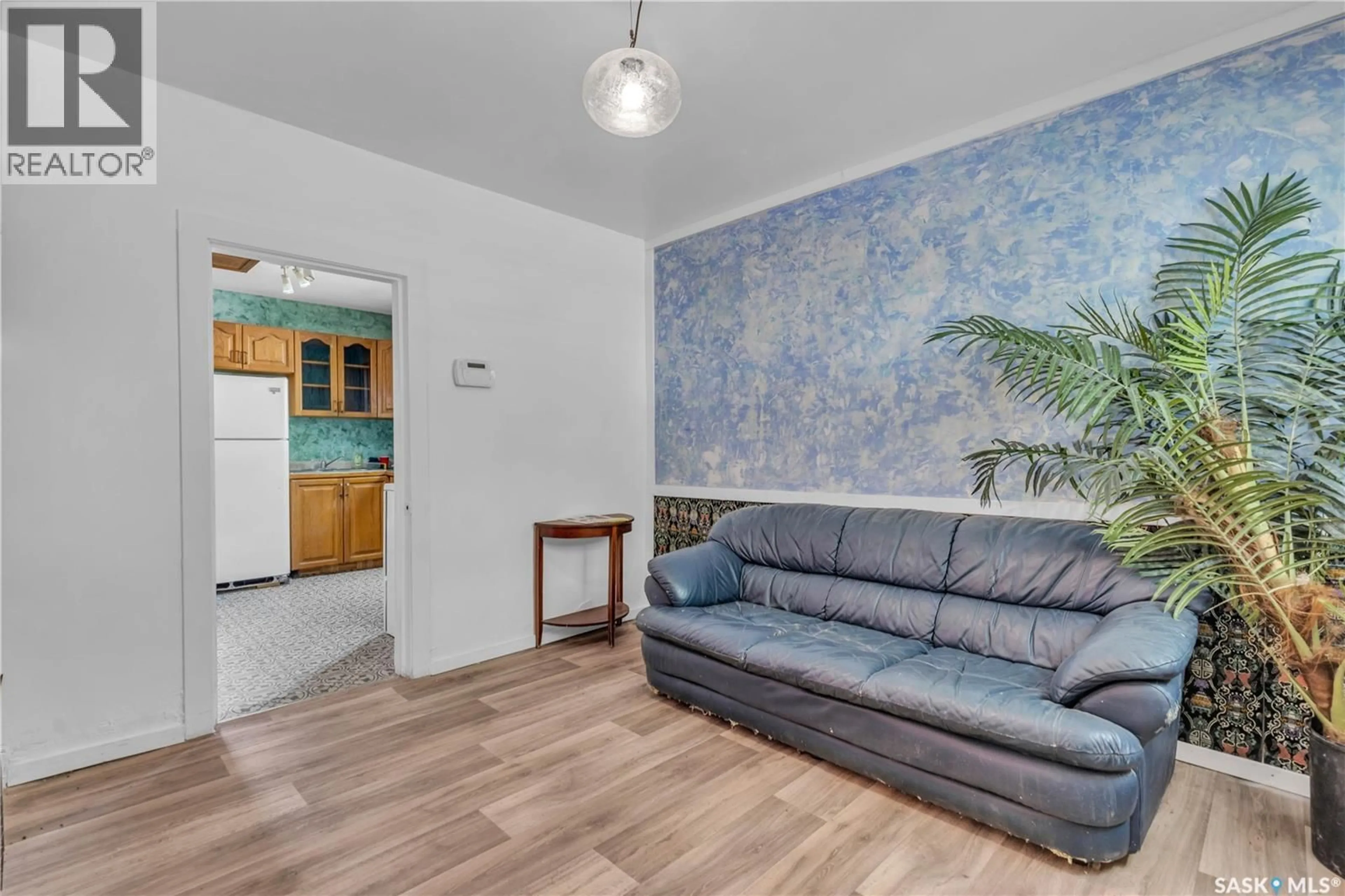 Living room with furniture, unknown for 1317 G AVENUE, Saskatoon Saskatchewan S7L2A6