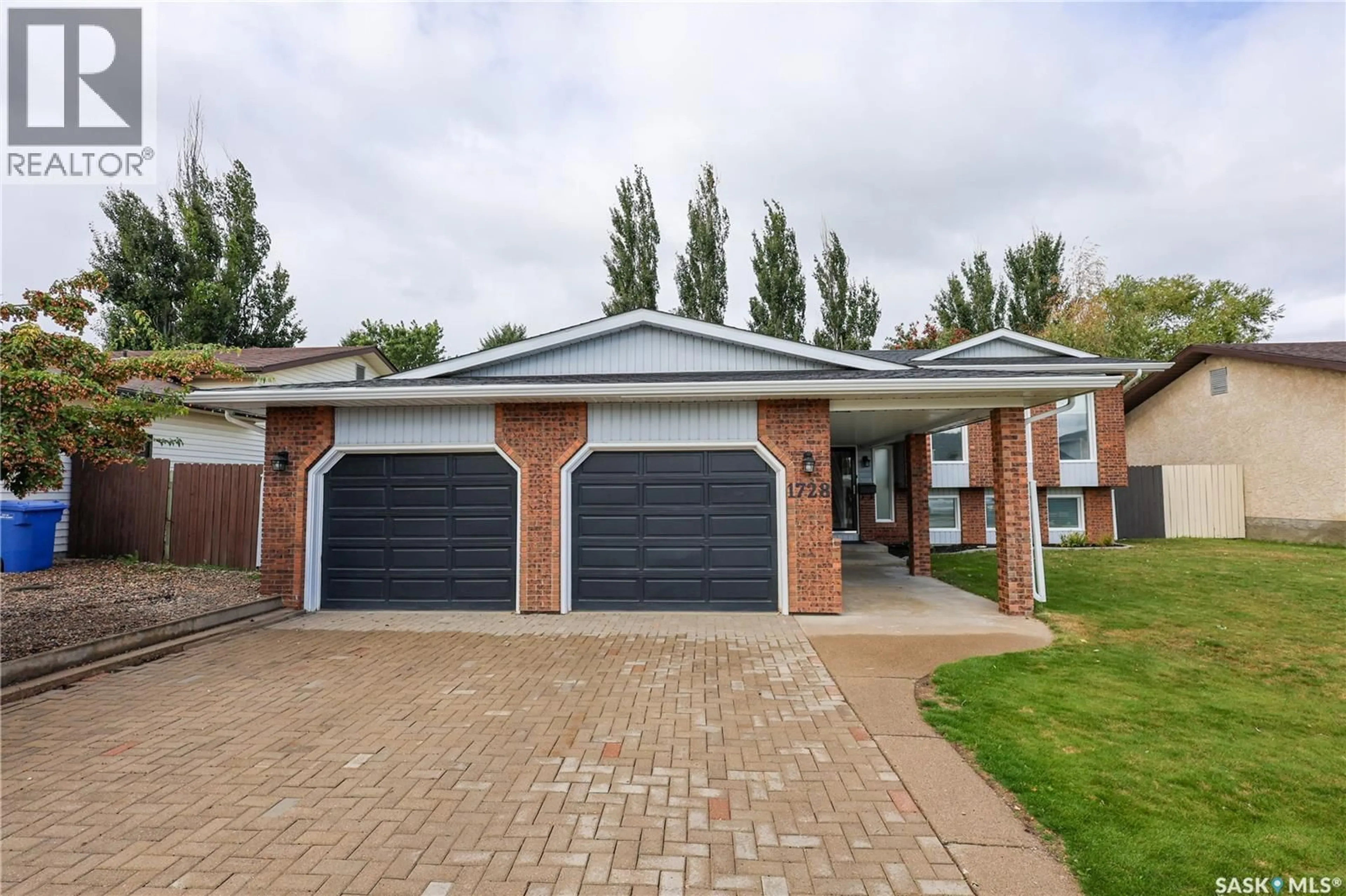 Home with brick exterior material, street for 1728 BARTON DRIVE, Prince Albert Saskatchewan S6V7W3