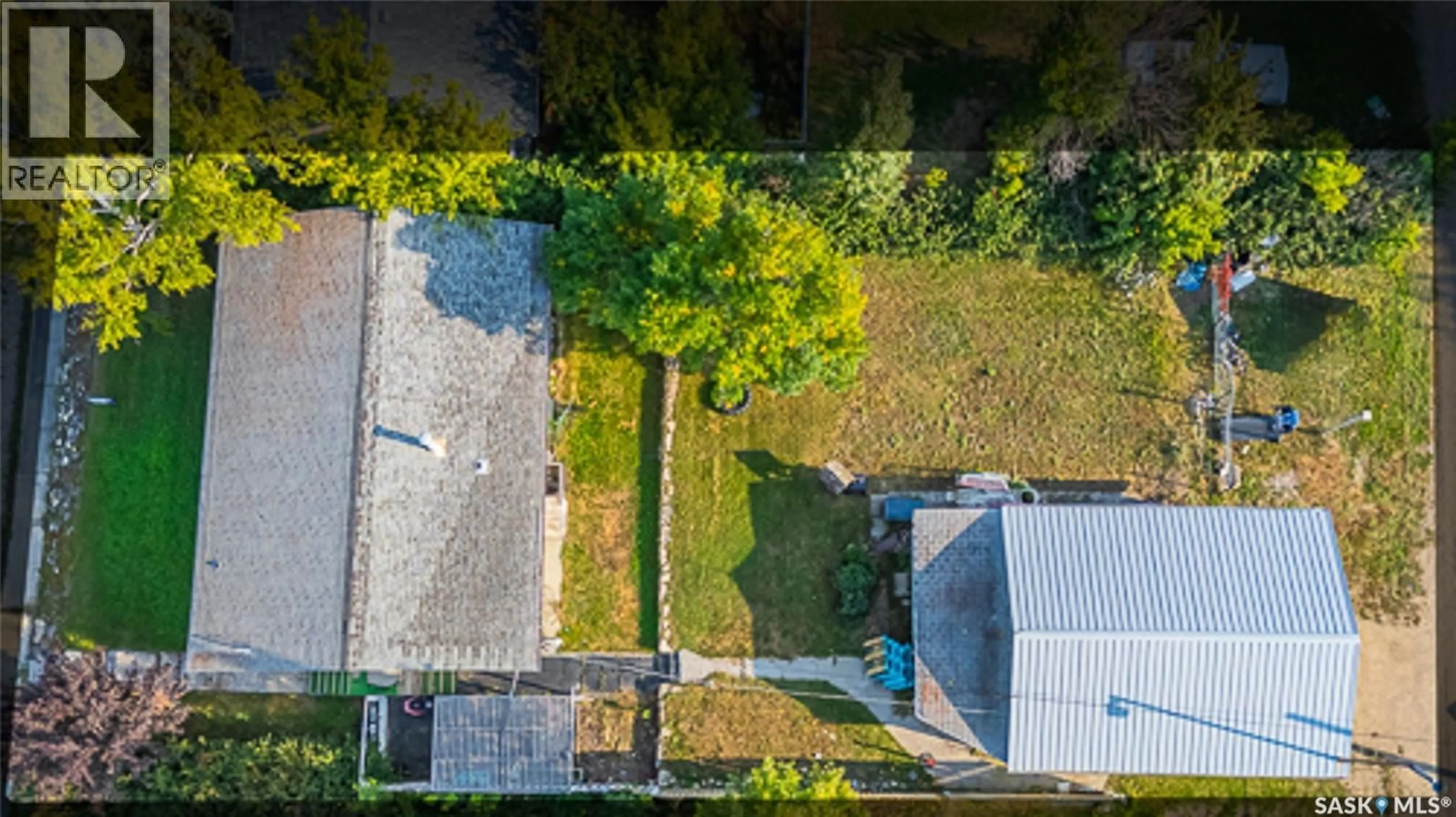 A pic from outside/outdoor area/front of a property/back of a property/a pic from drone, street for 308 3RD AVENUE, Young Saskatchewan S0K4Y0