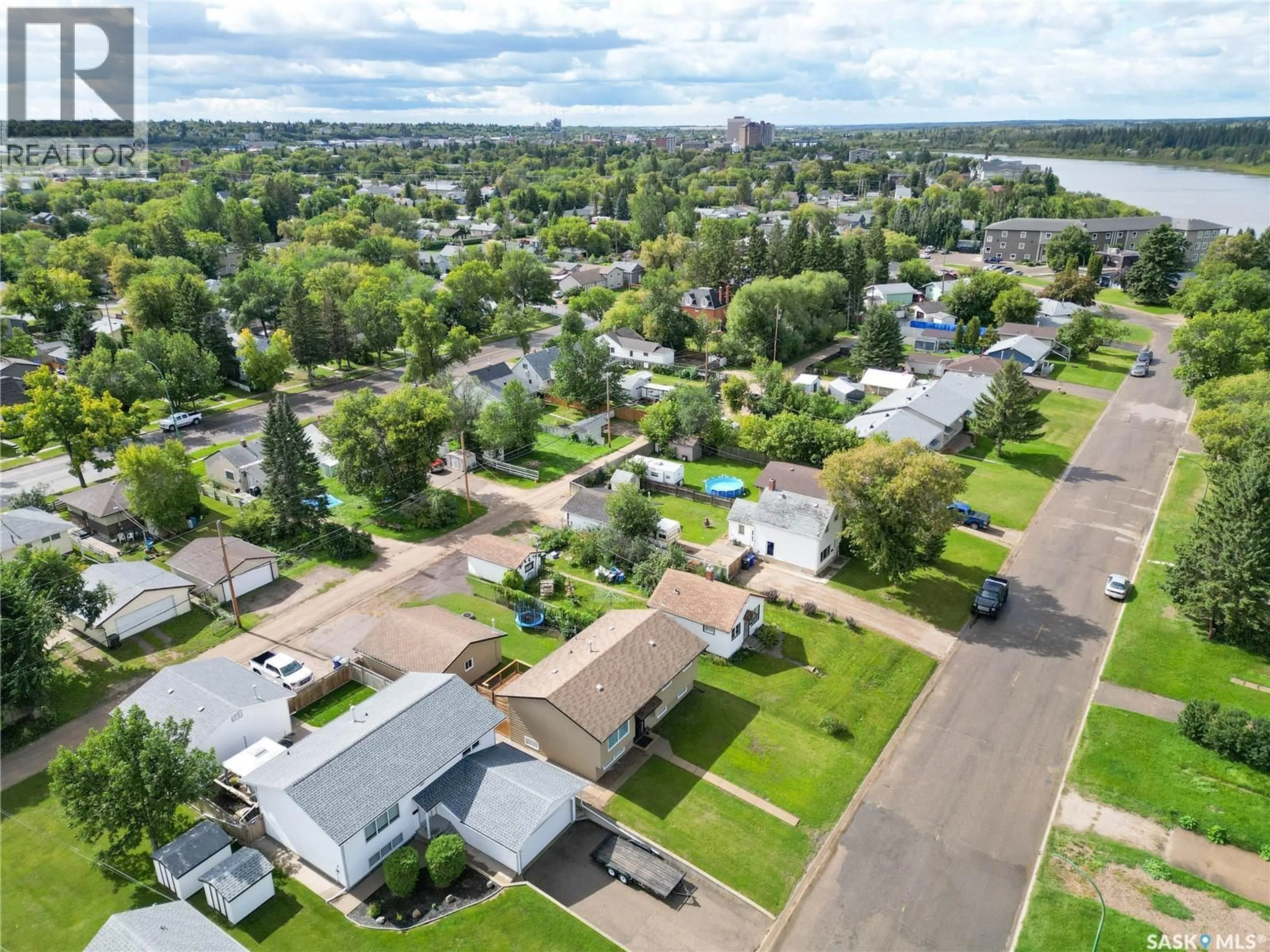 A pic from outside/outdoor area/front of a property/back of a property/a pic from drone, water/lake/river/ocean view for 755 3RD STREET, Prince Albert Saskatchewan S6V0H7