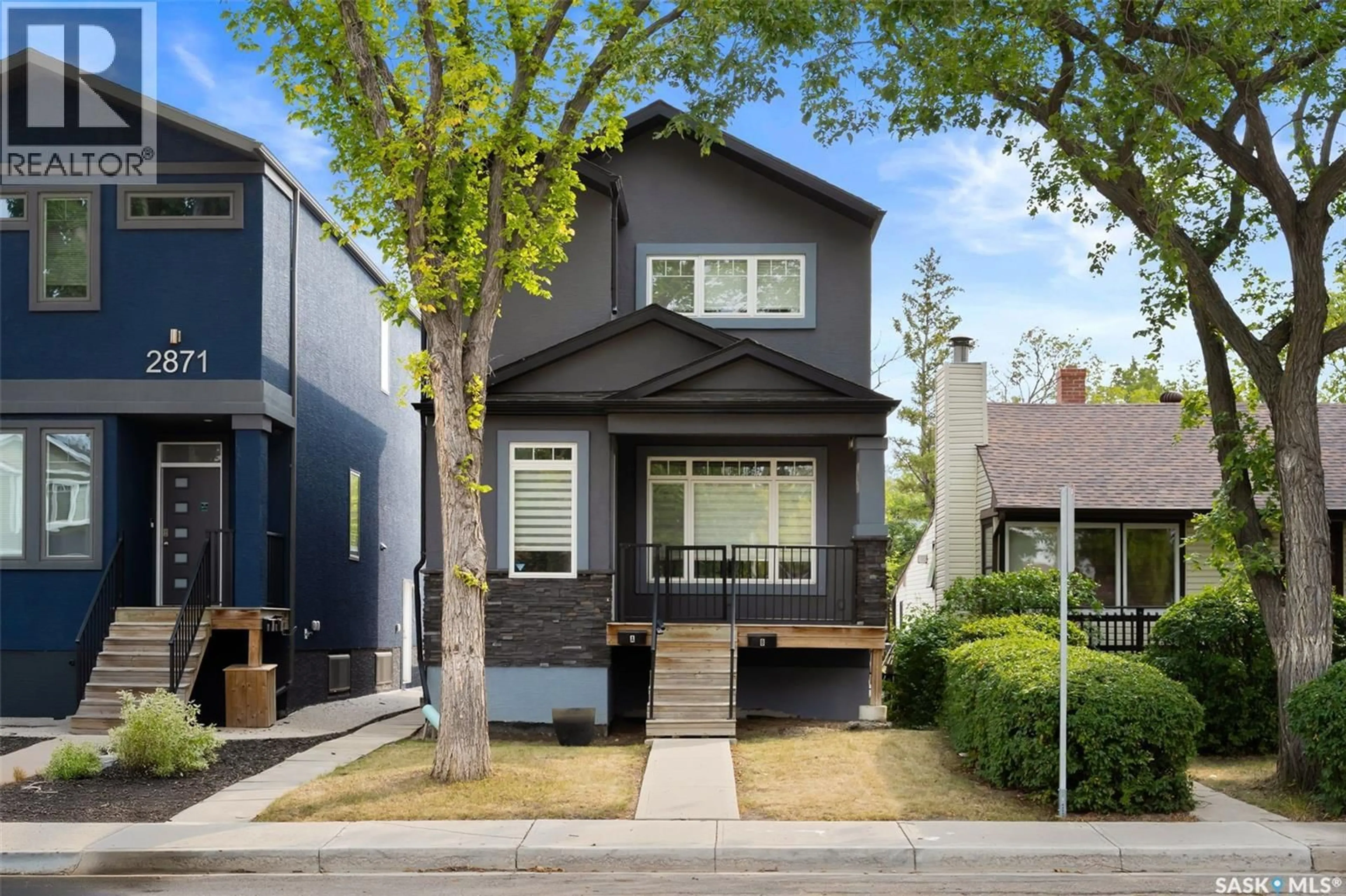 Home with vinyl exterior material, street for 2875 GARNET STREET, Regina Saskatchewan S4S1X1