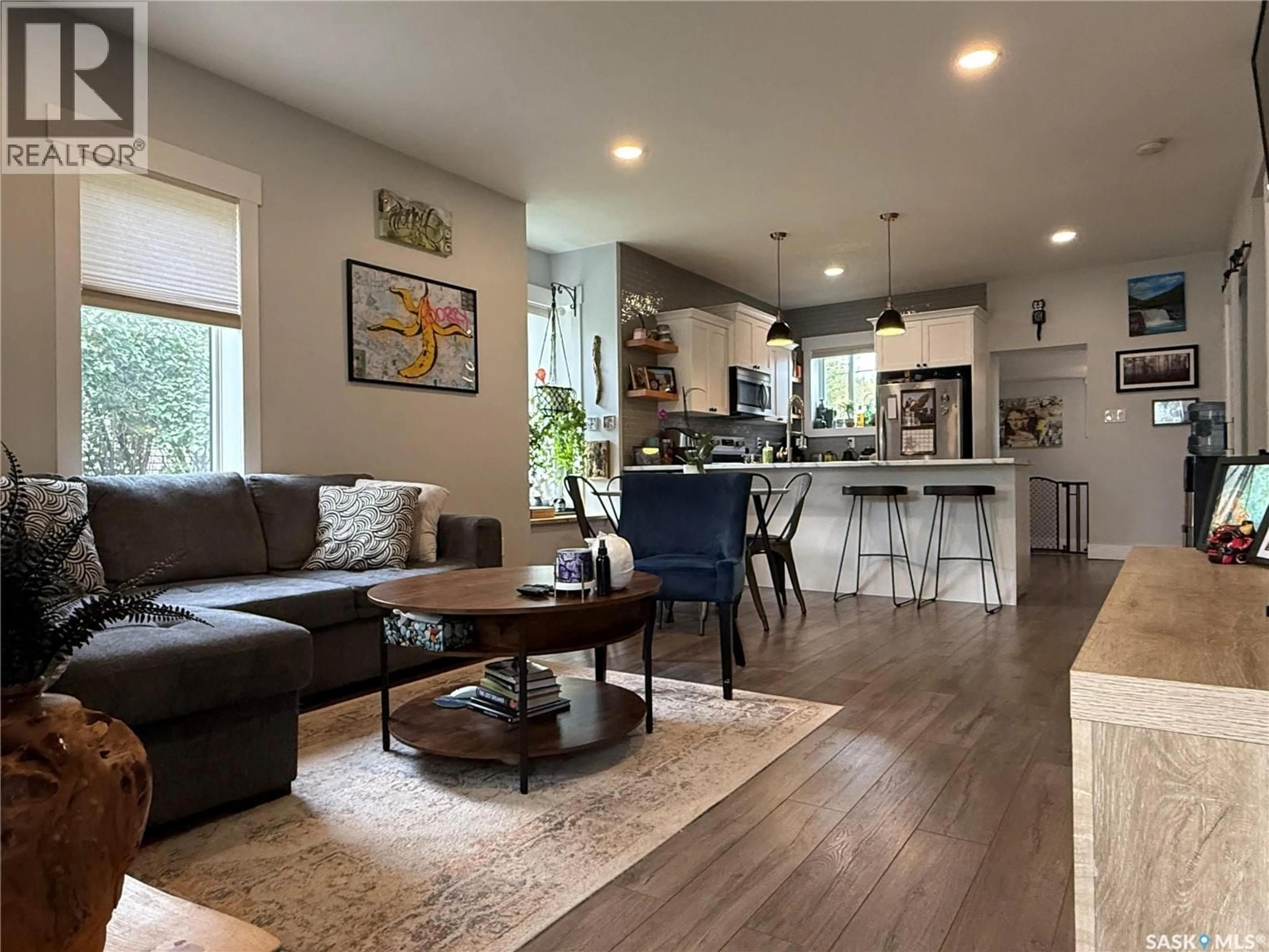 Open concept kitchen, wood/laminate floor for 322 5TH AVENUE, Melville Saskatchewan S0A2P0